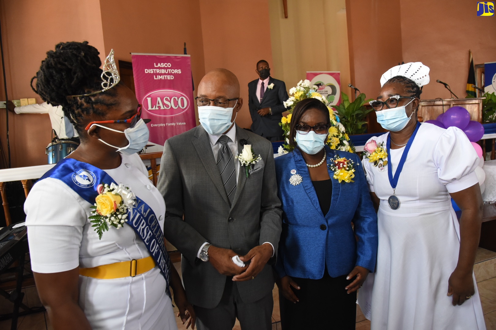 Permanent Secretary in the Ministry of Health and Wellness, Dunstan Bryan (second left), engages in light-hearted discussion with (from left), 2021-22 LASCO/Nurses Association of Jamaica (NAJ) Nurse of the Year, Lillian Lewis McDonald; Deputy Chief Nursing Officer, Jillian Mason Quarrie; and President of the NAJ, Patsy Edwards Henry. They were in attendance at a church service held as part of Healthcare Workers Appreciation Month activities at the Richmond Park Church of the Nazarene in Kingston on Sunday (July 17). The event was held in honour of healthcare workers at the Kingston and St. Andrew Health Department, Bustamante Hospital for Children, Sir John Golding Rehabilitation Centre, National Chest Hospital and Hope Institute.