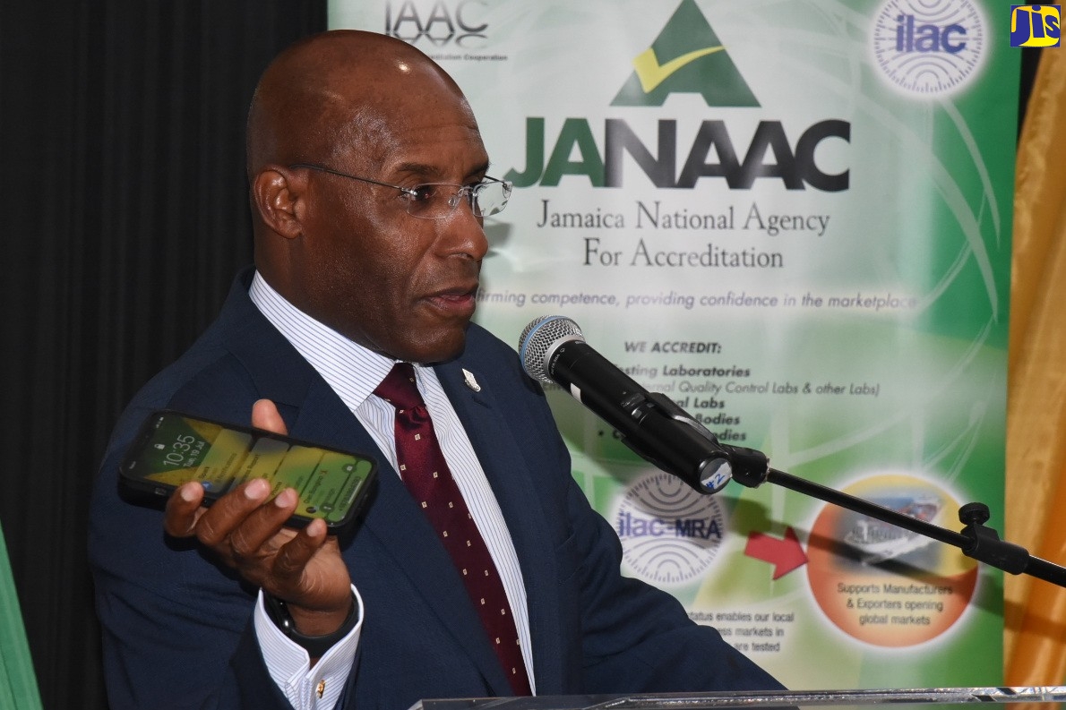 Minister of Industry, Investment and Commerce, Senator the Hon. Aubyn Hill, addresses the Jamaica National Accreditation Agency’s (JANAAC) United States Food and Drug Administration (FDA) Accredited Third-Party Certification Programme certificate semi-virtual presentation ceremony on Tuesday (July 19). The event was held at The Jamaica Pegasus hotel in New Kingston. JANAAC is an agency of the Ministry.