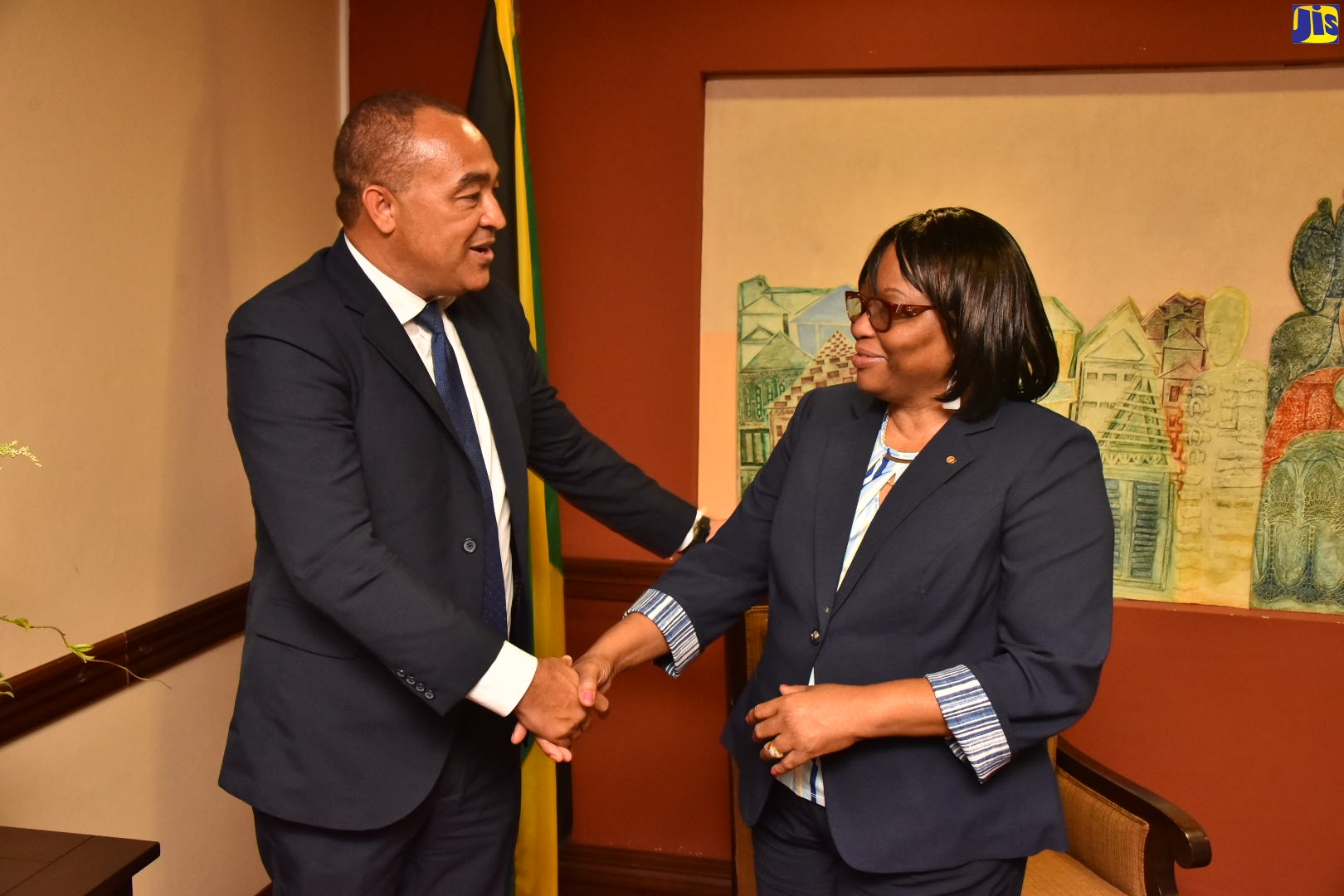 Minister of Health and Wellness, Dr. the Hon. Christopher Tufton (left), greets Director of the Pan American Health Organisation (PAHO), Dr. Carissa F. Etienne,  following her arrival on July 26 at the Norman Manley International Airport in Kingston. Dr. Etienne will engage in a series of events hosted by the Ministry, until Friday, July 29 when she departs.
