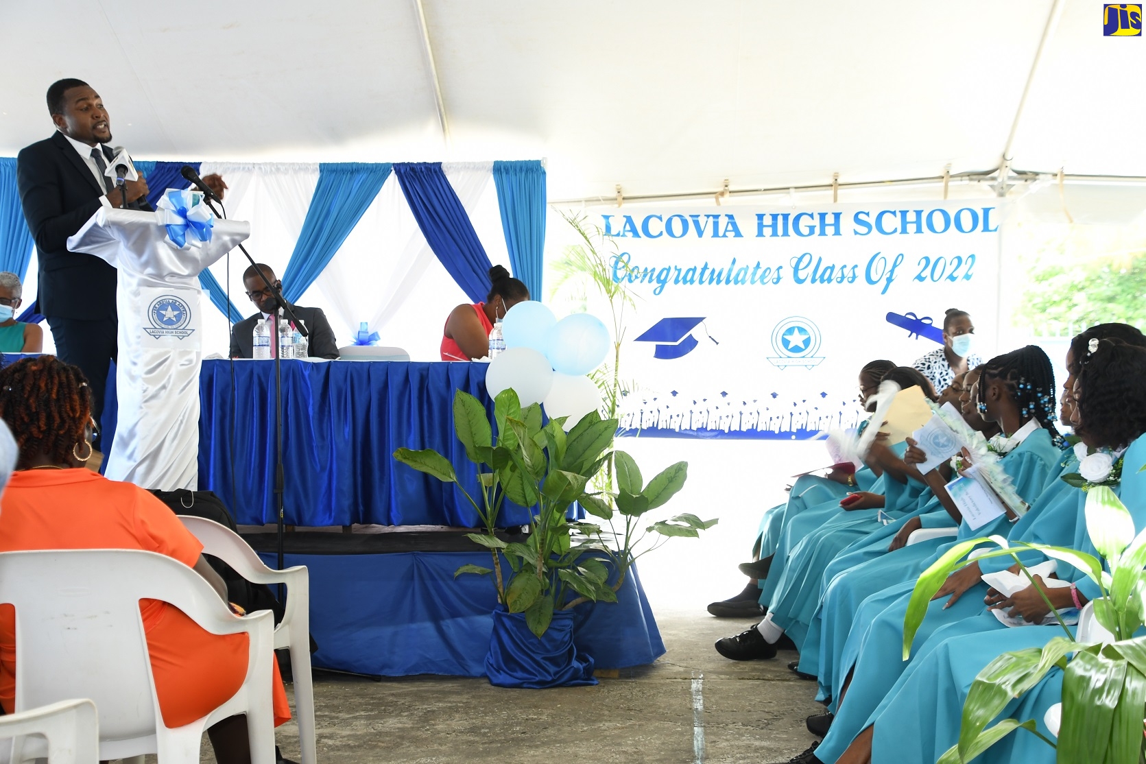 Minister without Portfolio in the Office of the Prime Minister with responsibility for Information, Hon. Robert Nesta Morgan, addresses graduates at the Lacovia High School Valedictory Service in St. Elizabeth on Tuesday (July 5).