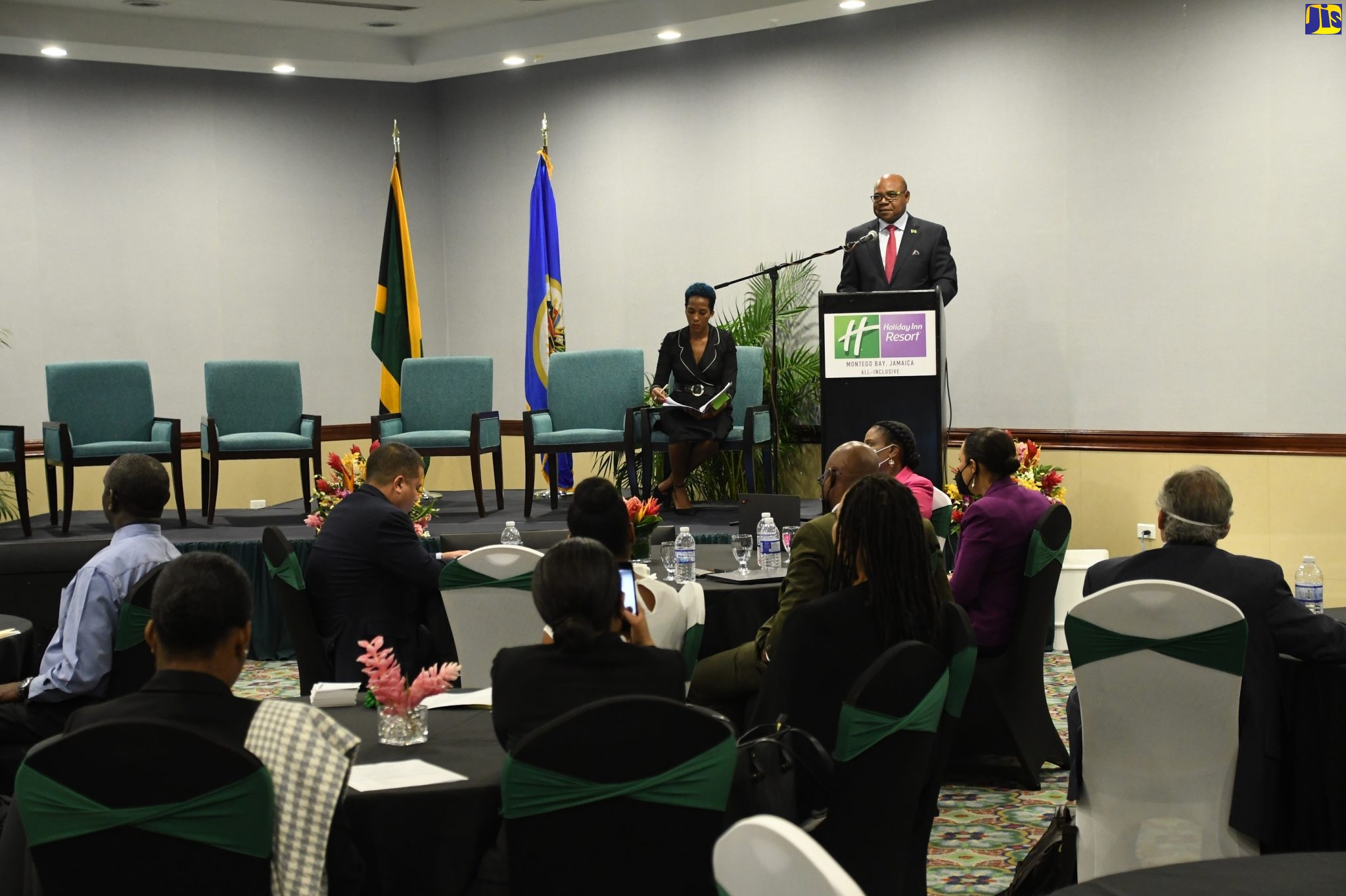 Minister of Tourism, Hon. Edmund Bartlett, speaking on day one of the inaugural Organization of American States (OAS) high-level policy forum on building the resilience of Small and Medium Tourism Enterprises (SMTEs) in the Caribbean to Disasters at the Holiday Inn Resort in Montego Bay, St. James, on Wednesday (July 20).
