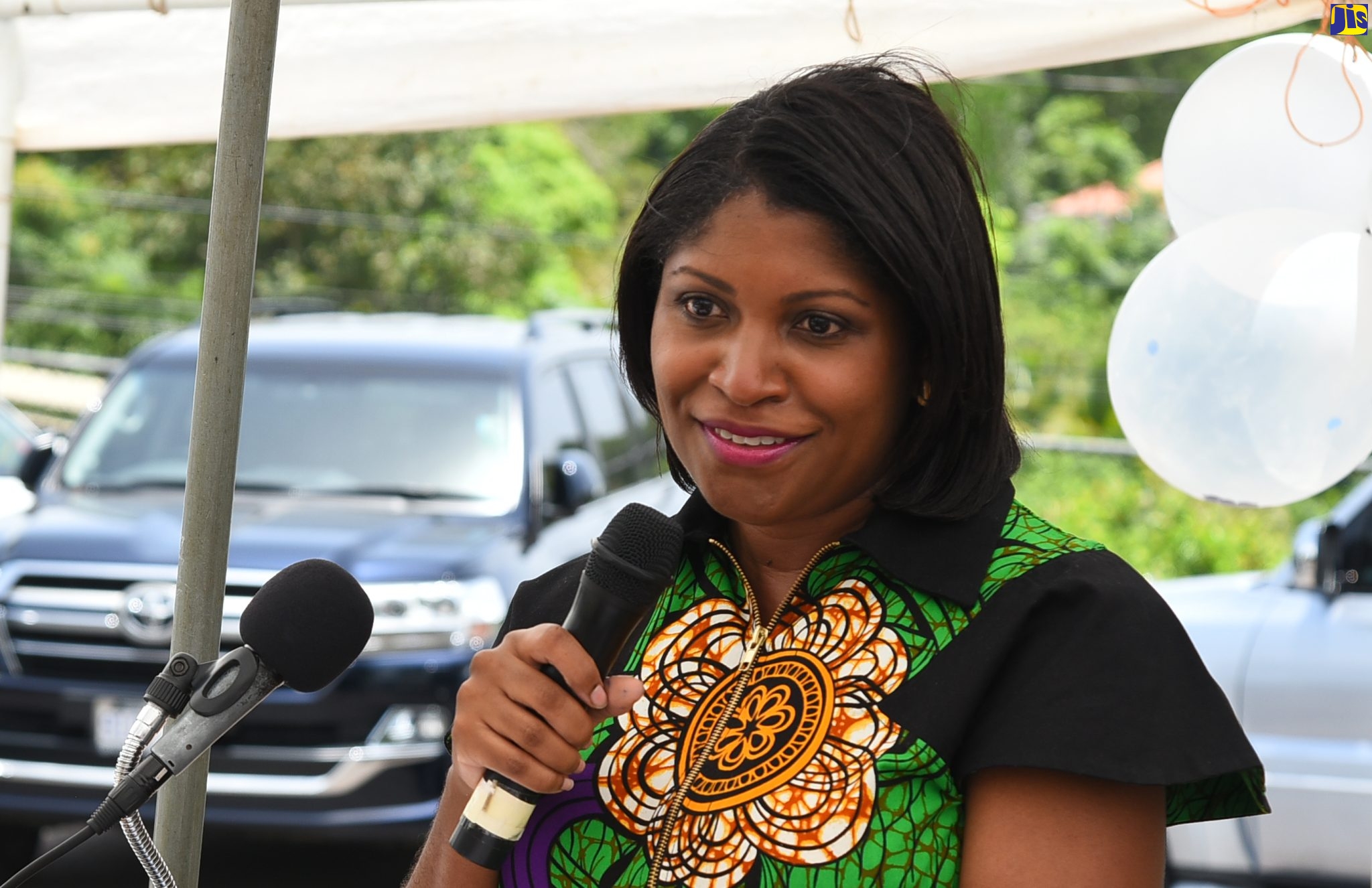 Executive Director, National Education Trust (NET), Latoya Harris, speaks at the handover of a state-of-the-art computer/multipurpose centre to the Three Hills Primary School by Couples Resorts, Tower Isle, on July 14, at the school’s location in Charles Town District, St. Mary.