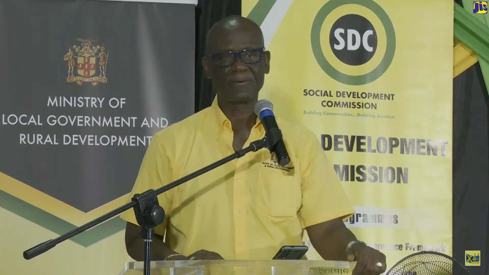 Minister of Local Government and Rural Development, Hon. Desmond McKenzie, addresses residents of Rocky Point, Clarendon, on July 7 at the first of a series of disaster preparedness Town Halls. 

