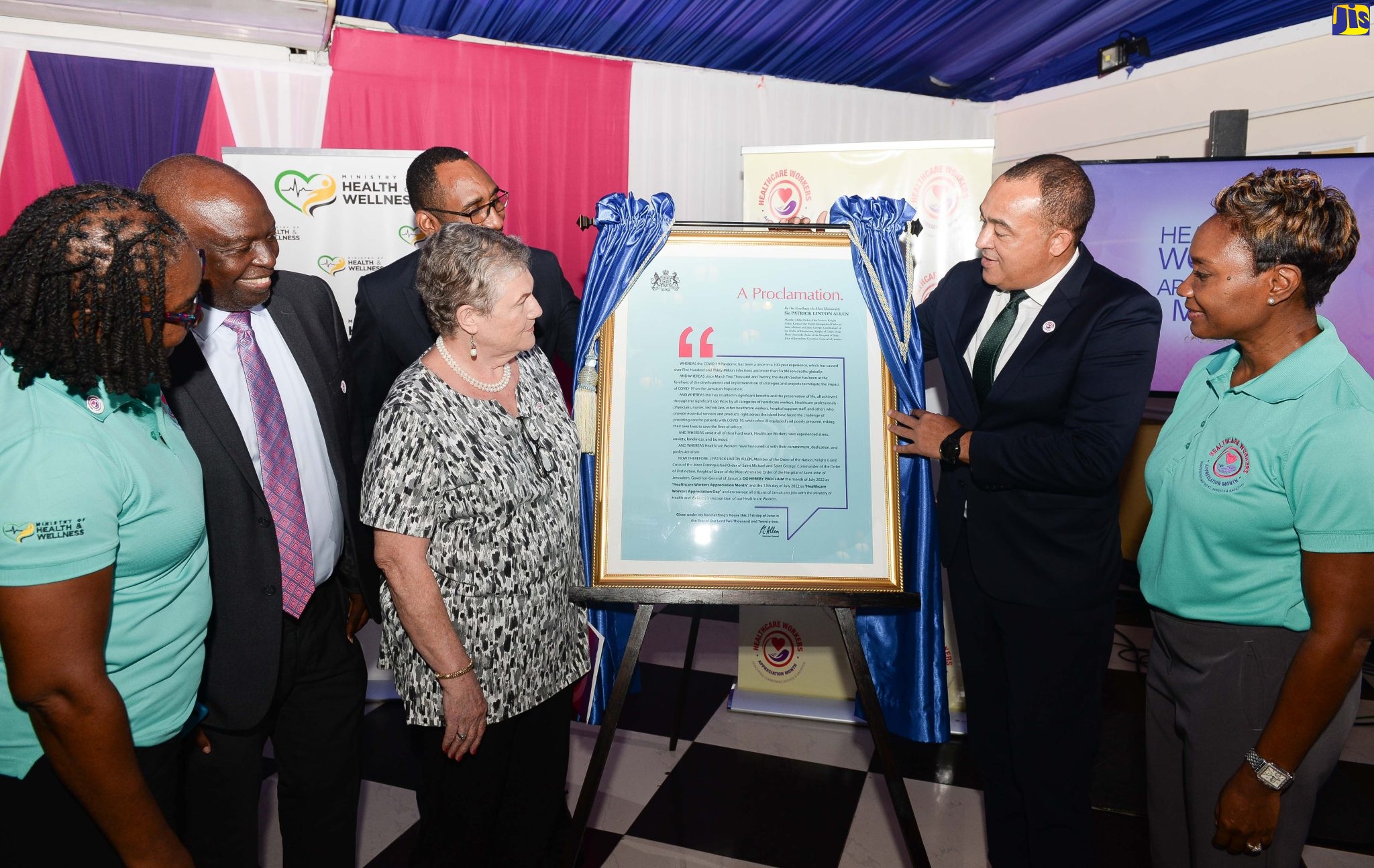 Minister of Health and Wellness, Dr. the Hon. Christopher Tufton (second right), unveils the Healthcare Workers Appreciation Month Proclamation, at the official launch of the month of activities on Monday (July 4), at the Terra Nova All-Suite Hotel in St. Andrew. He is joined by (from left) President of the Nurses Association of Jamaica (NAJ), Patsy Edwards-Henry; President of the Medical Association of Jamaica (MAJ), Dr. Brian James; Chairperson for the Healthcare Workers Appreciation Month National Planning Committee, Professor the Most Hon. Dr. Denise Eldemire-Shearer; President of the Jamaica Civil Service Association (JCSA), O’Neil Grant; and Minister of State in the Ministry, Hon. Juliet Cuthbert-Flynn.