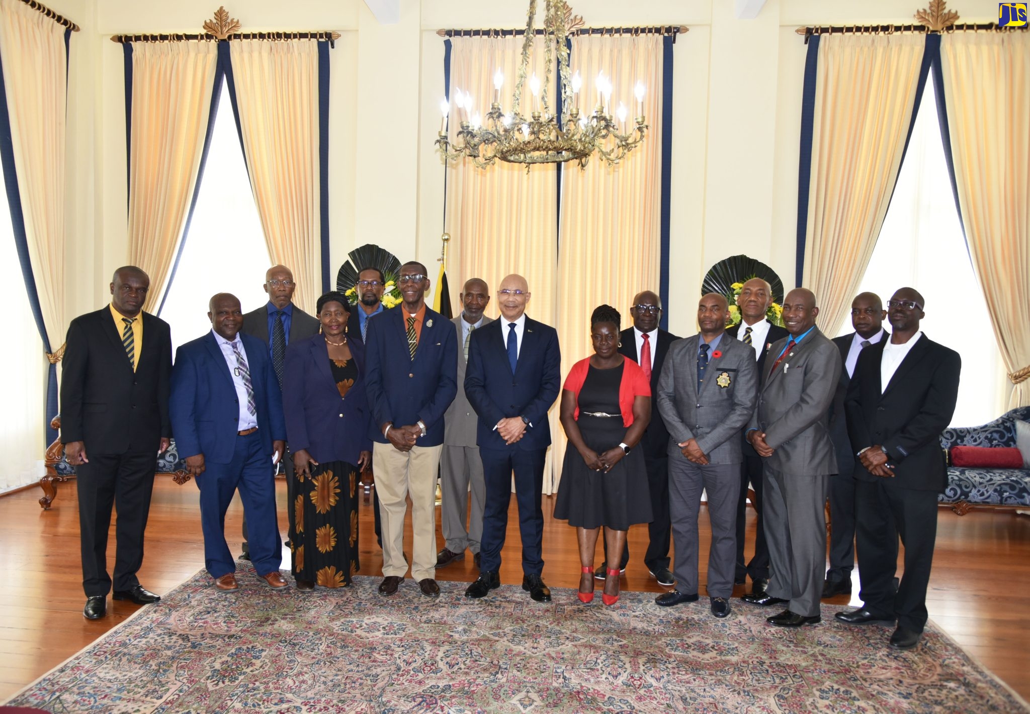 Governor-General, His Excellency the Most Hon. Sir Patrick Allen (centre), with board members of the Jamaica Ex-Soldiers Association (JESA), during a courtesy call at King’s House on Thursday (July 28).
