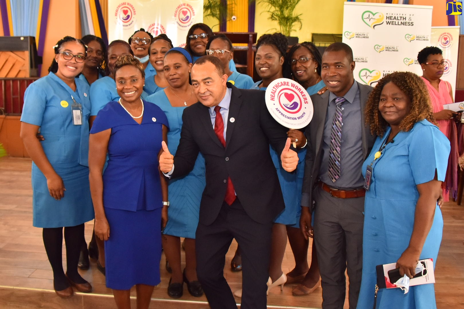 Minister of Health and Wellness, Dr. the Hon. Christopher Tufton (front, second left), and Minister of State in the Ministry, Hon. Juliet Cuthbert-Flynn (front, left), shares a moment with healthcare workers, at a Thanksgiving Service to mark July as Healthcare Workers Appreciation Month, held on Sunday (July 3), at the Boulevard Baptist Church in Kingston.