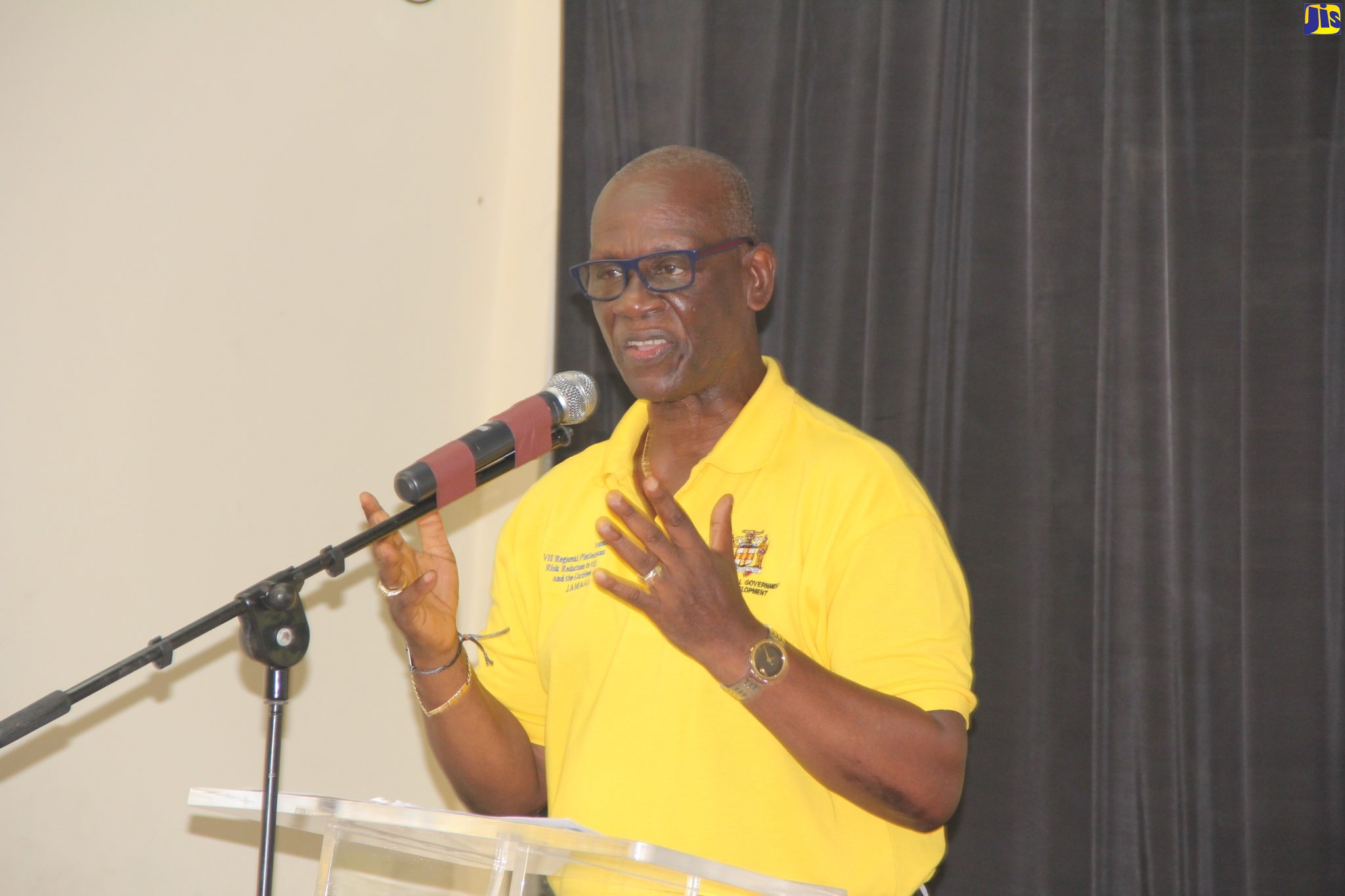 Minister of Local Government and Rural Development, Hon. Desmond McKenzie, addresses a Disaster Preparedness Town Hall Meeting in Whitehouse, Westmoreland, on July 14.