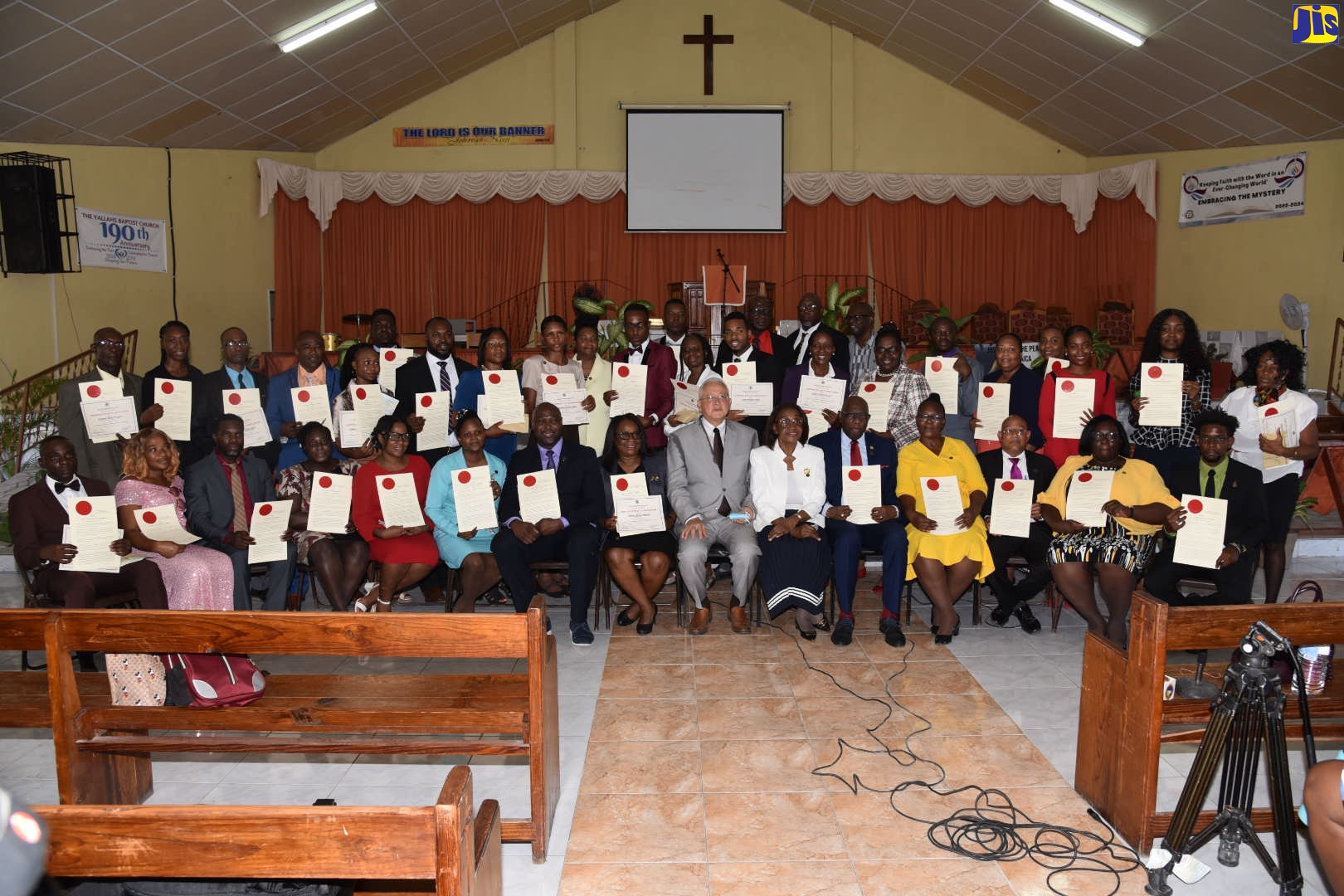Minister of Justice, Hon. Delroy Chuck (seated, front row seventh right) and Custos of St. Thomas, Marcia Bennett (seated, front row sixth right), with the 40 newly minted Justices of the Peace in St. Thomas during a commissioning ceremony on Thursday (July 21) at the Yallahs Baptist Church in the parish.