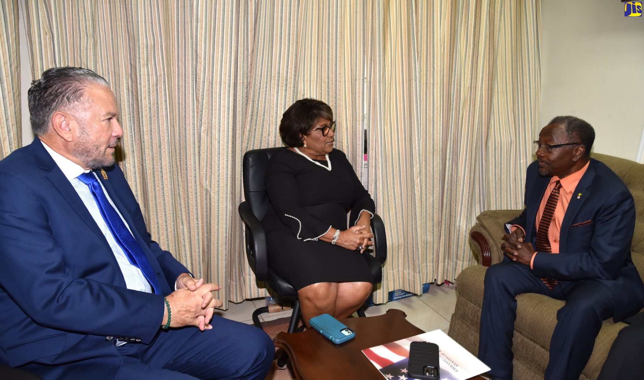 Speaker of the House of Representatives, Hon. Marisa Dalrymple-Philibert (centre) engages in conversation with Ambassador of the United States to Jamaica, His Excellency Nick Perry (right) during a courtesy call at Gordon House on July 12. Looking on is President of the Senate, Senator the Hon. Thomas Tavares-Finson.
