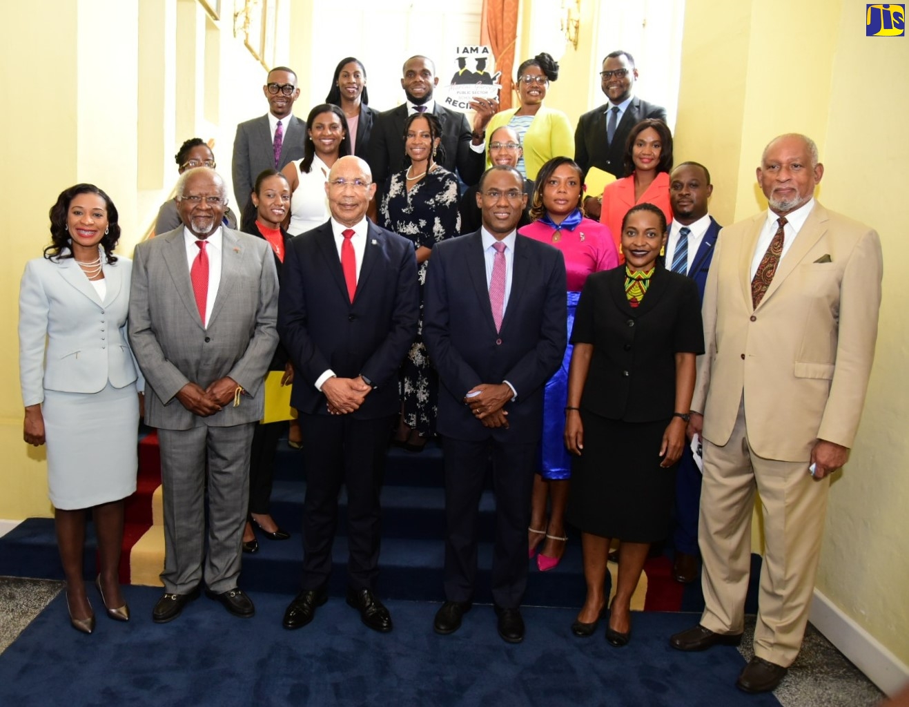 Dr. Taneisha Ingleton, Managing Director, HEART/NSTA Trust; Dr. Julius Garvey, son of the Right Excellent Marcus Mosiah Garvey, ONH; His Excellency the Most Honourable, Sir Patrick Allen, ON, GCMG, CD, KSt.J, Governor-General of Jamaica; Hon. Nigel Clarke, DPhil., MP, Minister of Finance and the Public Service; Hon. Marsha Smith, MP, Minister of State in the Ministry of Finance and the Public Service and Ambassador Douglas Saunders, Cabinet Secretary, are seen with the recipients of the 2022 Marcus Garvey Public Sector Graduate Scholarship Programme after the awards ceremony on Wednesday (August 17), at King’s House.