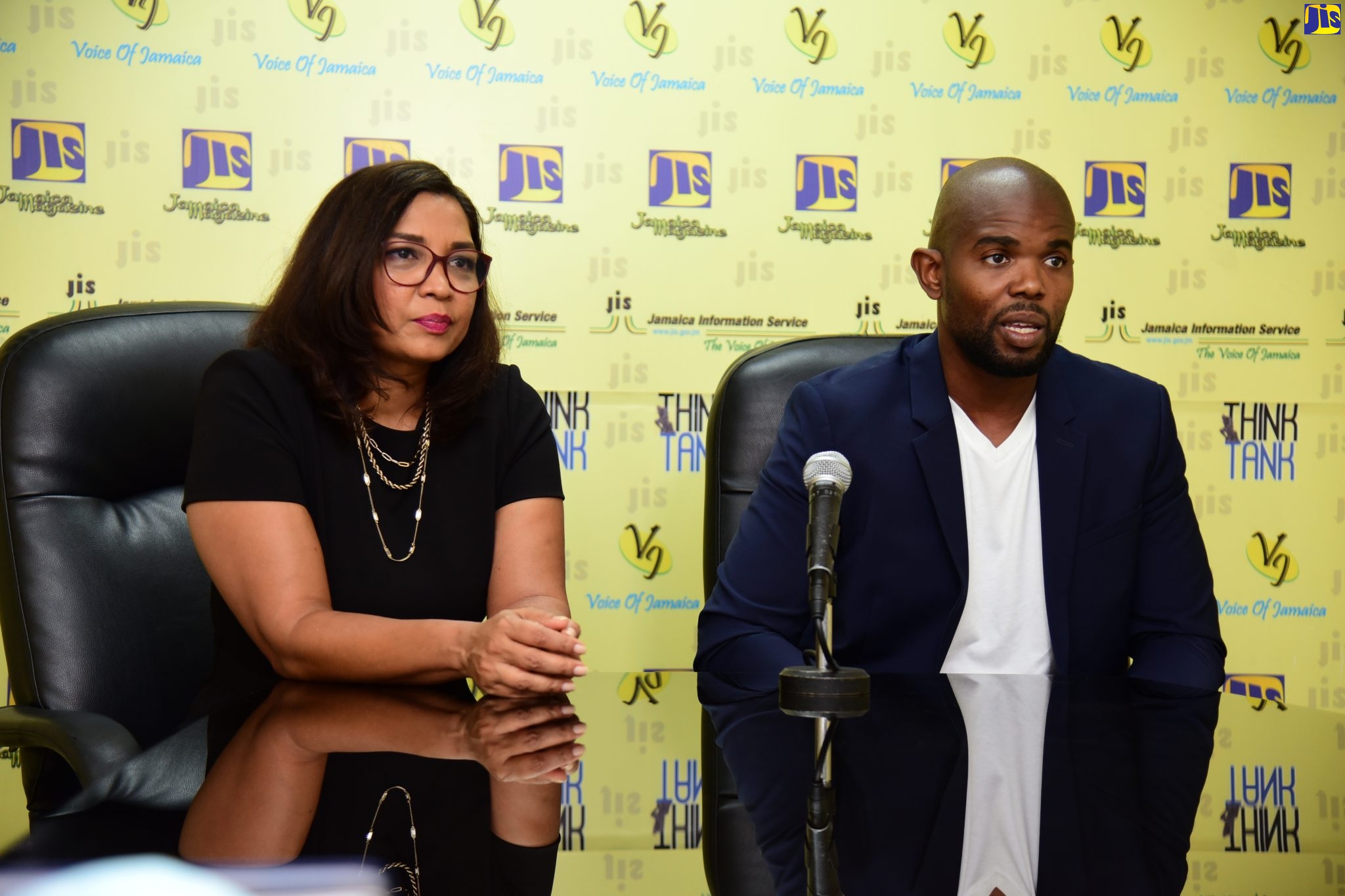 Chief Product Officer, Lynk, John Matthew Sinclair, addresses JIS ‘Think Tank’, today (August 18).  At left is Chief Growth Officer at Lynk, Denise Williams.