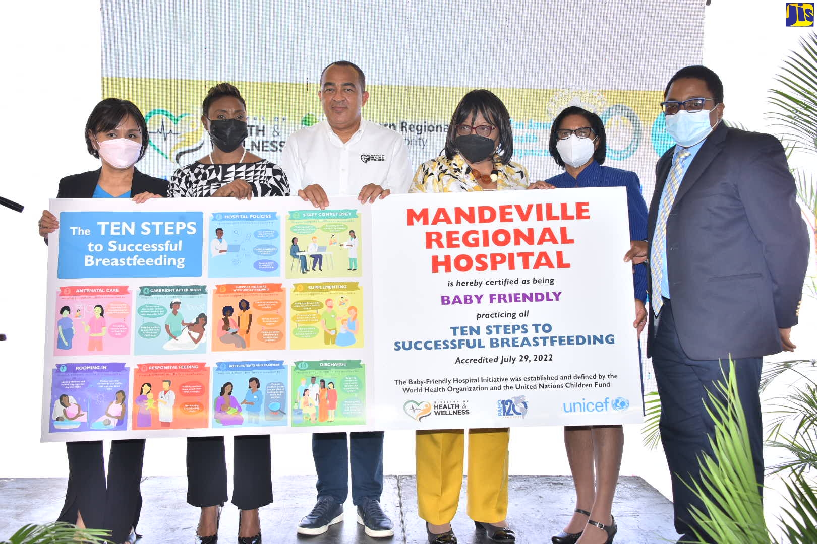 Minister of Health and Wellness, Dr. the Hon. Christopher Tufton (third left), along with Minister of State in the Ministry, Hon. Juliet Cuthbert-Flynn (second left), and Director of the Pan American Health Organization (PAHO), Dr. Carissa Etienne (third right), celebrate the accreditation of the Mandeville Regional Hospital as a Baby Friendly Hospital during a recent ceremony at the institution in Manchester. Others (from left) are United Nations Children’s Fund (UNICEF), Representative in Jamaica, Mariko Kagoshima; Director of Nursing Services at the hospital, Saidie Williams-Allen; and Chief Executive Officer of the hospital, Alwyn Miller.