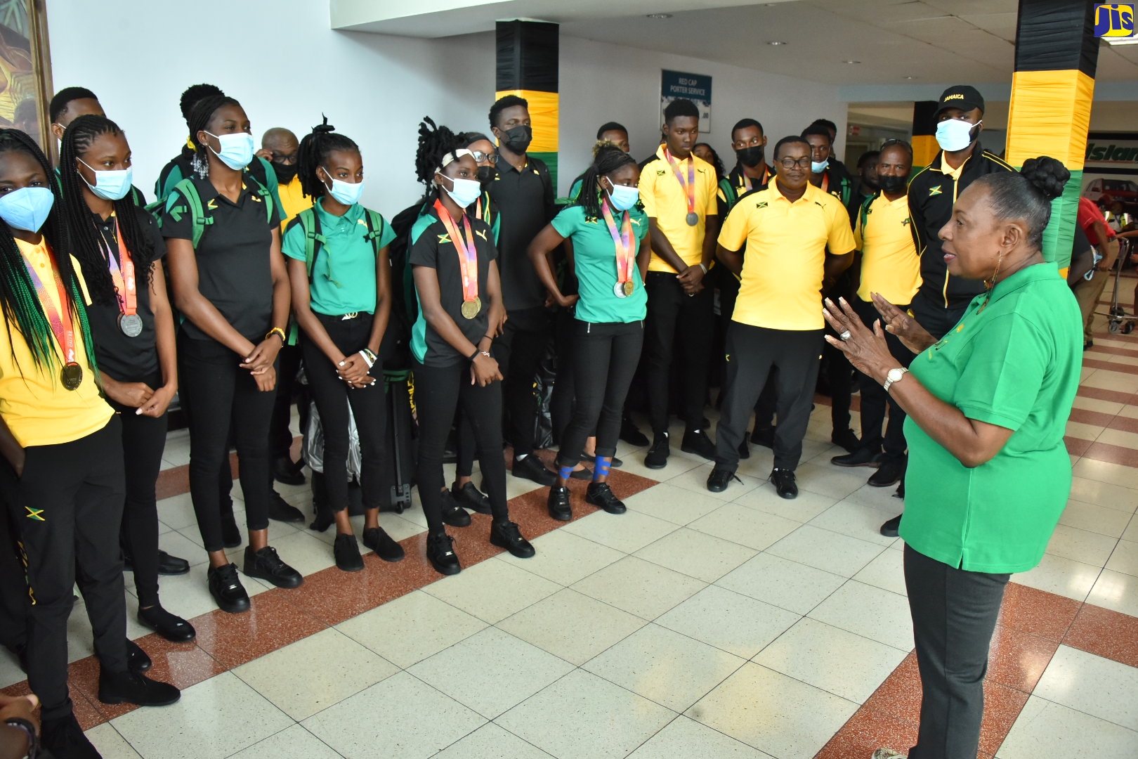 PHOTOS: Minister Grange Receives Athletes at NMIA