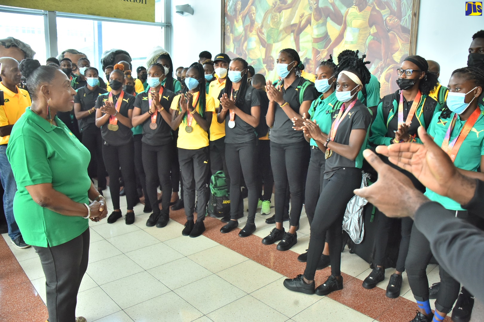 PHOTOS: Minister Grange Receives Athletes at NMIA