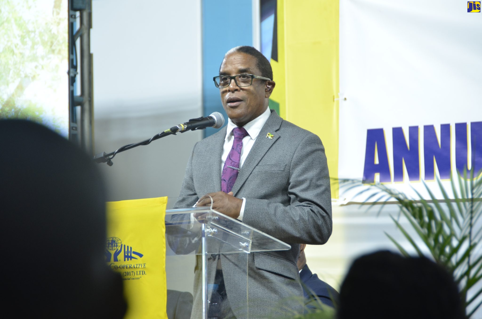 Minister of State in the Ministry of Industry, Investment and Commerce, Dr. the Hon. Norman Dunn, addresses the annual general meeting of the Gateway Co-Operative Credit Union Limited, which was held at the Noel Fraser Auditorium, West Jamaica Conference of Seventh Day Adventists in St. James on Thursday (August 11).