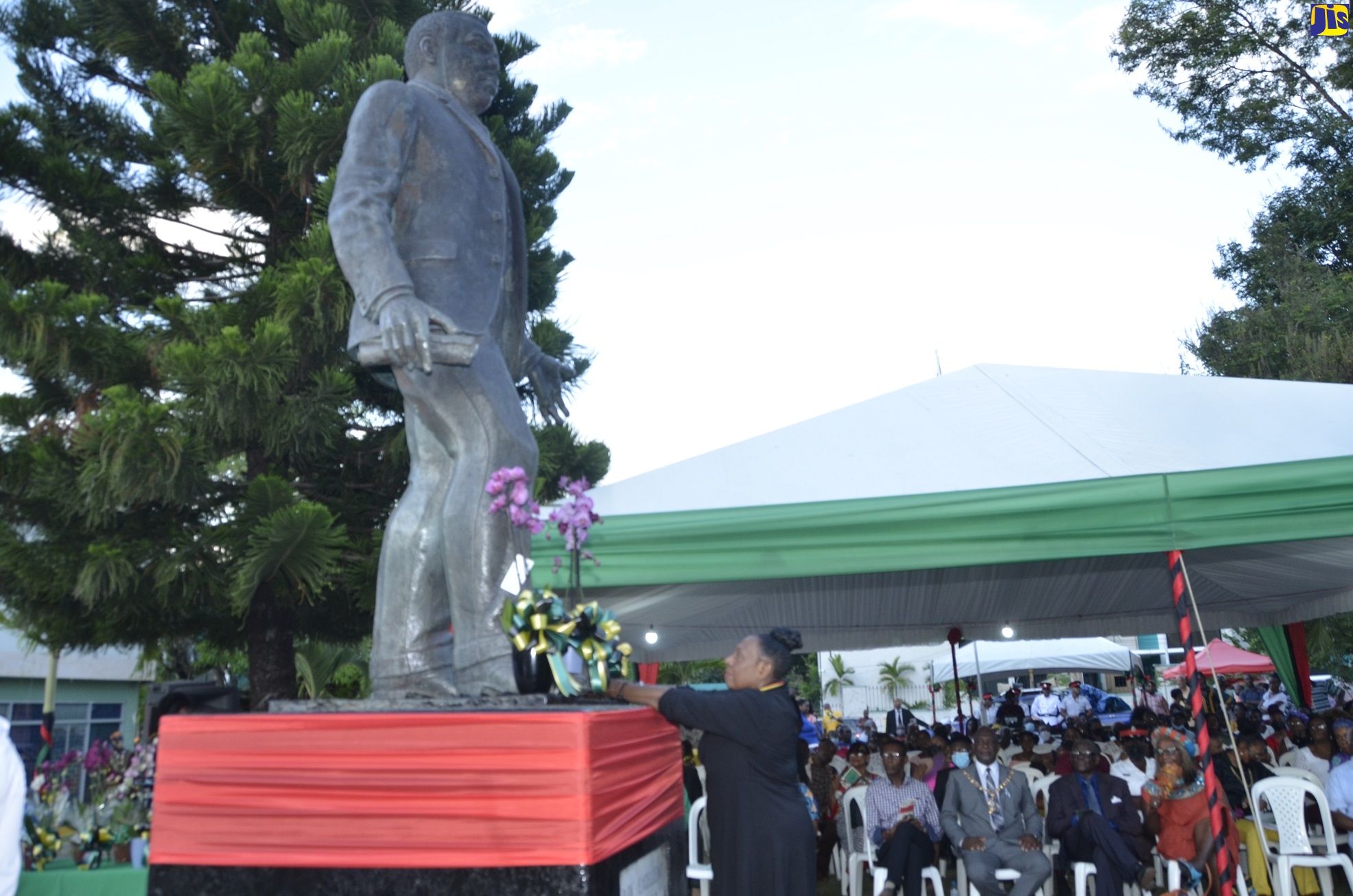 Minister of Culture, Gender, Entertainment and Sport, Hon. Olivia Grange, lays a floral tribute at the life-sized statue of National Hero, the Right Excellent Marcus Garvey, during a civic ceremony to mark the 135th anniversary of the birth of the National Hero, held at Lawrence Park, St. Ann’s Bay, St. Ann, on Wednesday, August 17.

