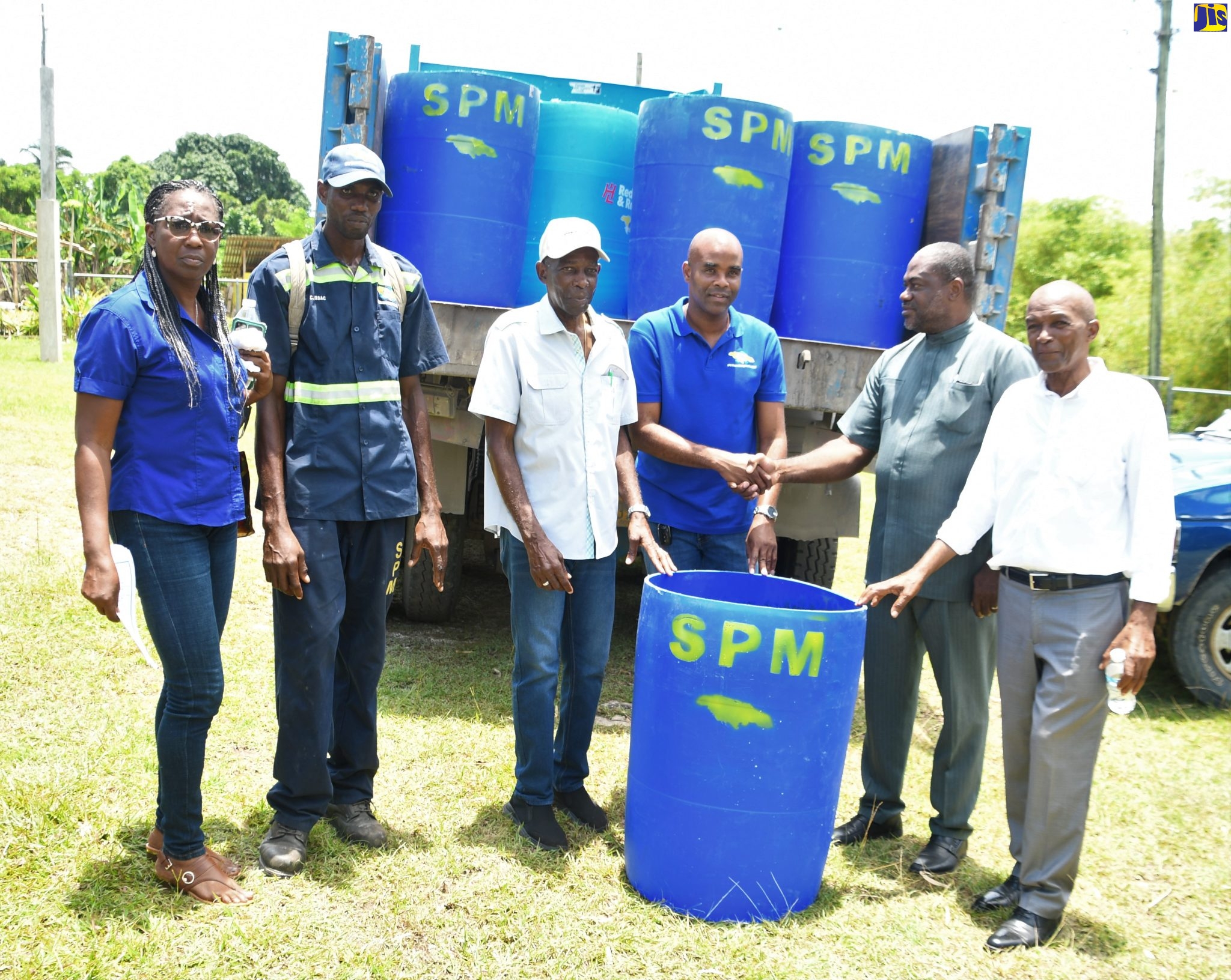 Holland Village Gets Drums for Proper Disposal of Garbage