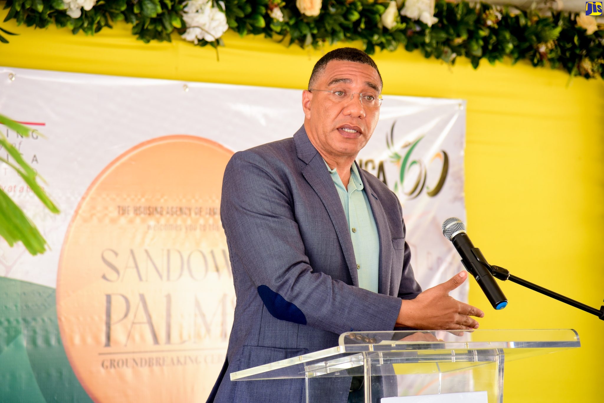 Prime Minister, the Most Hon. Andrew Holness, speaks at the ground-breaking ceremony for the Sandown Palms housing development in Portmore, St. Catherine, on August 26. 