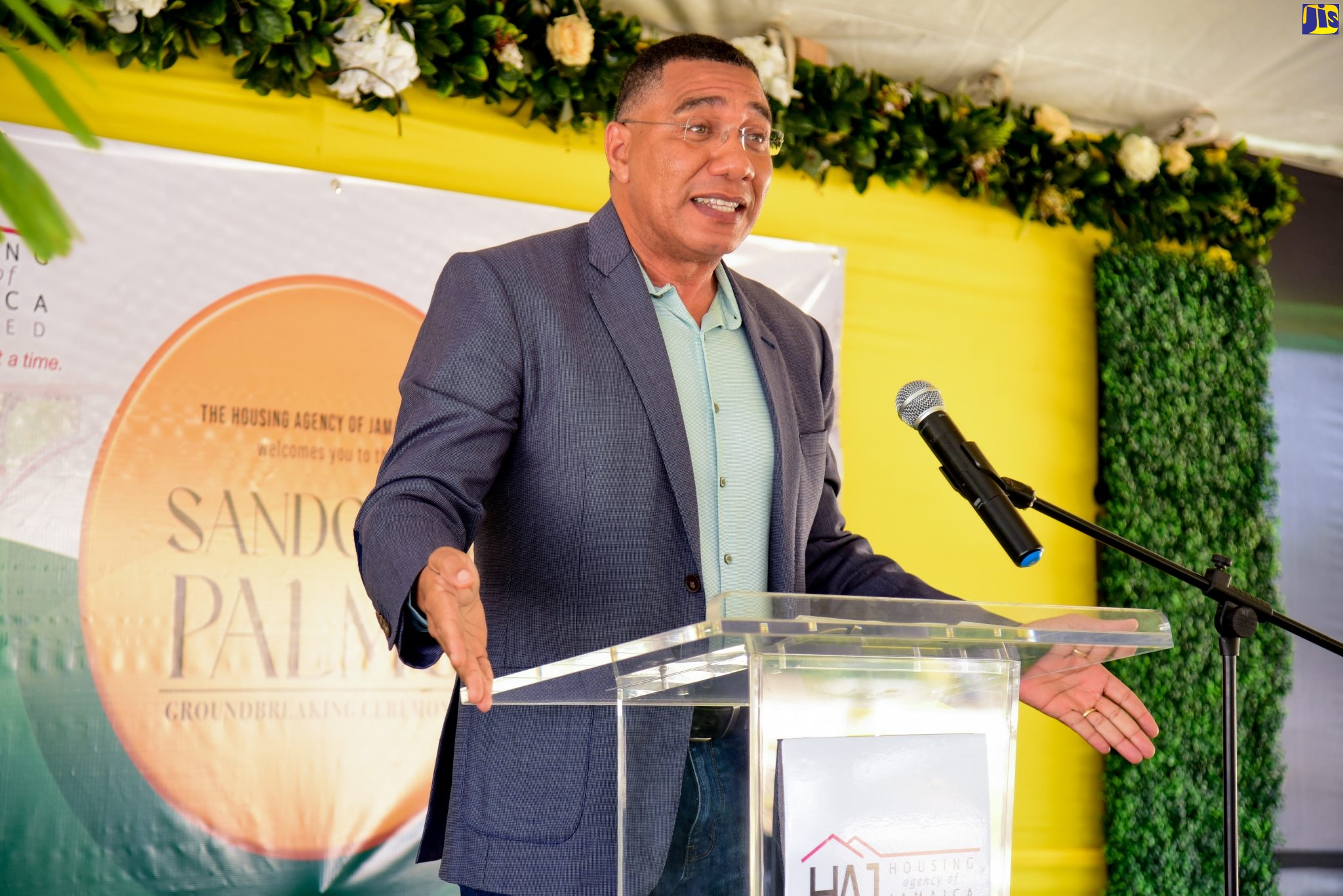 Prime Minister, the Most Hon. Andrew Holness, speaking at the ground-breaking ceremony for the Sandown Palms housing development in Portmore, St. Catherine, on August 26.