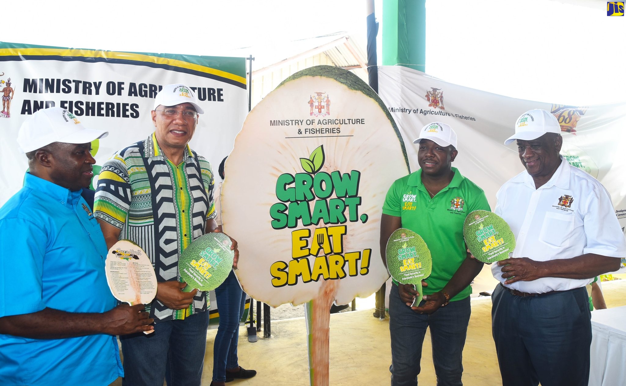 Prime Minister, the Most Hon. Andrew Holness (second left), with Minister of Agriculture and Fisheries, Hon. Pearnel Charles Jr. (second right); Permanent Secretary in the Ministry, Dermon Spence (left), and State Minister, Frank Witter, at the official launch of the ‘Grow Smart, Eat Smart’ campaign on August 1. It was held at the 68th Denbigh Agricultural, Industrial and Food Show, Denbigh Showground, Clarendon.   