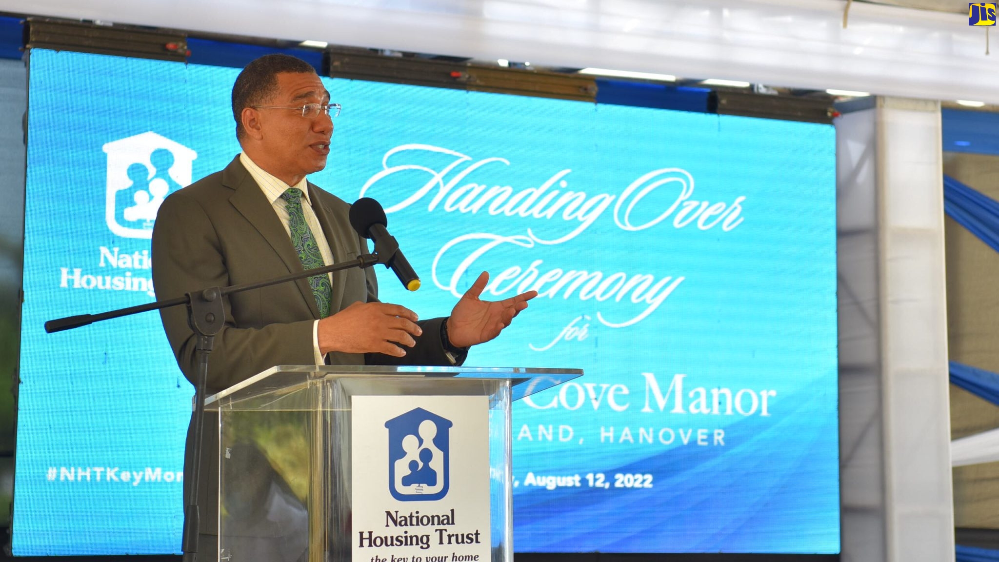 Prime Minister the Most Hon. Andrew Holness addresses the handing over ceremony of the NHT Industry Cove Manor houses in Green Island, Hanover on Friday (August 12).  