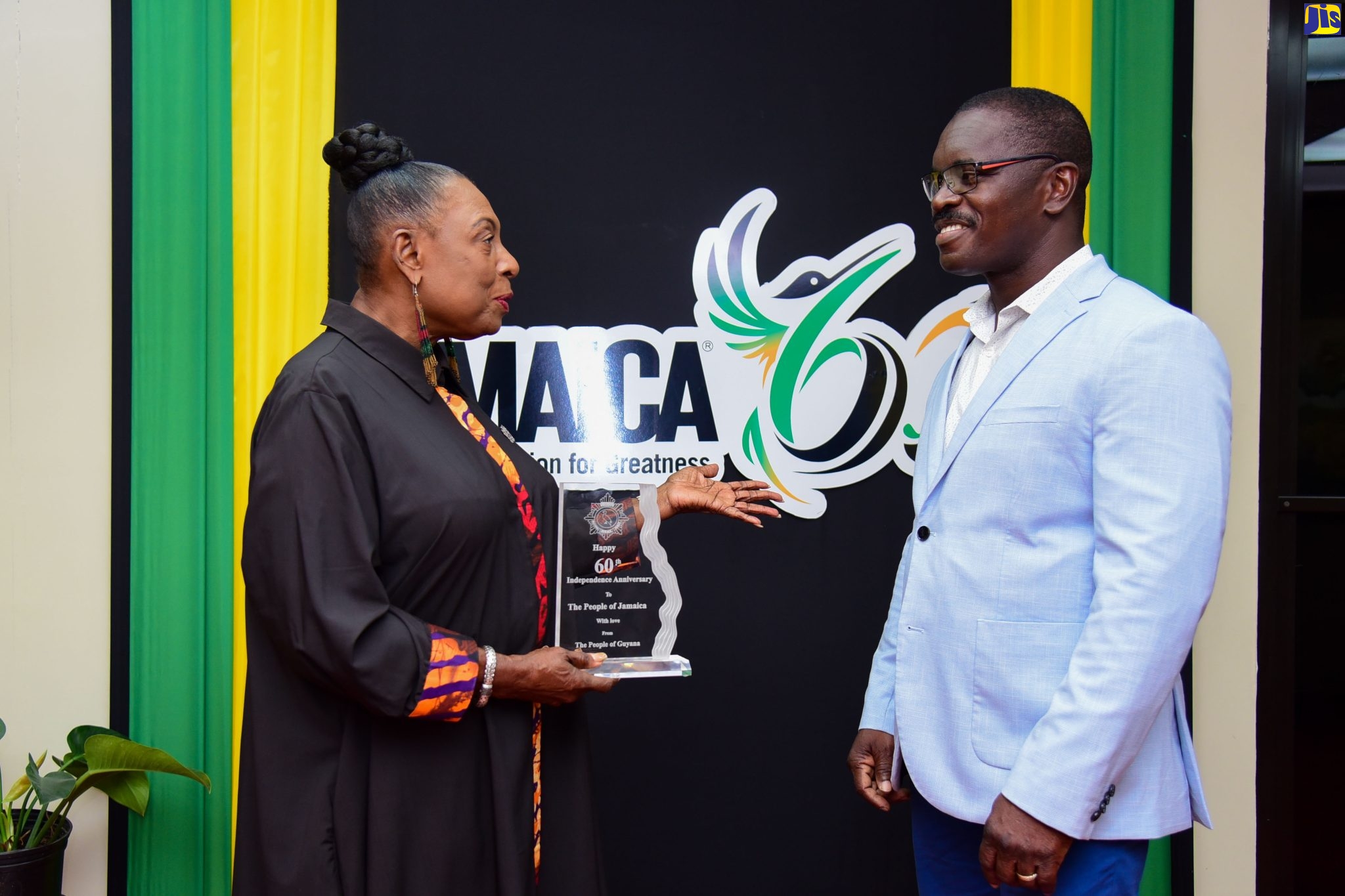 PHOTOS: Minister Grange Receives Plaque from People of Guyana