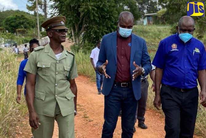 Minister of State in the Ministry of National Security, Hon. Zavia Mayne (centre); Permanent Secretary, Courtney Williams (right), and Commissioner of Corrections, Lieutenant Colonel (Retired) Gary Rowe, on a tour of the New Broughton Sunset Adult Correctional Centre in Manchester, on August 10.
