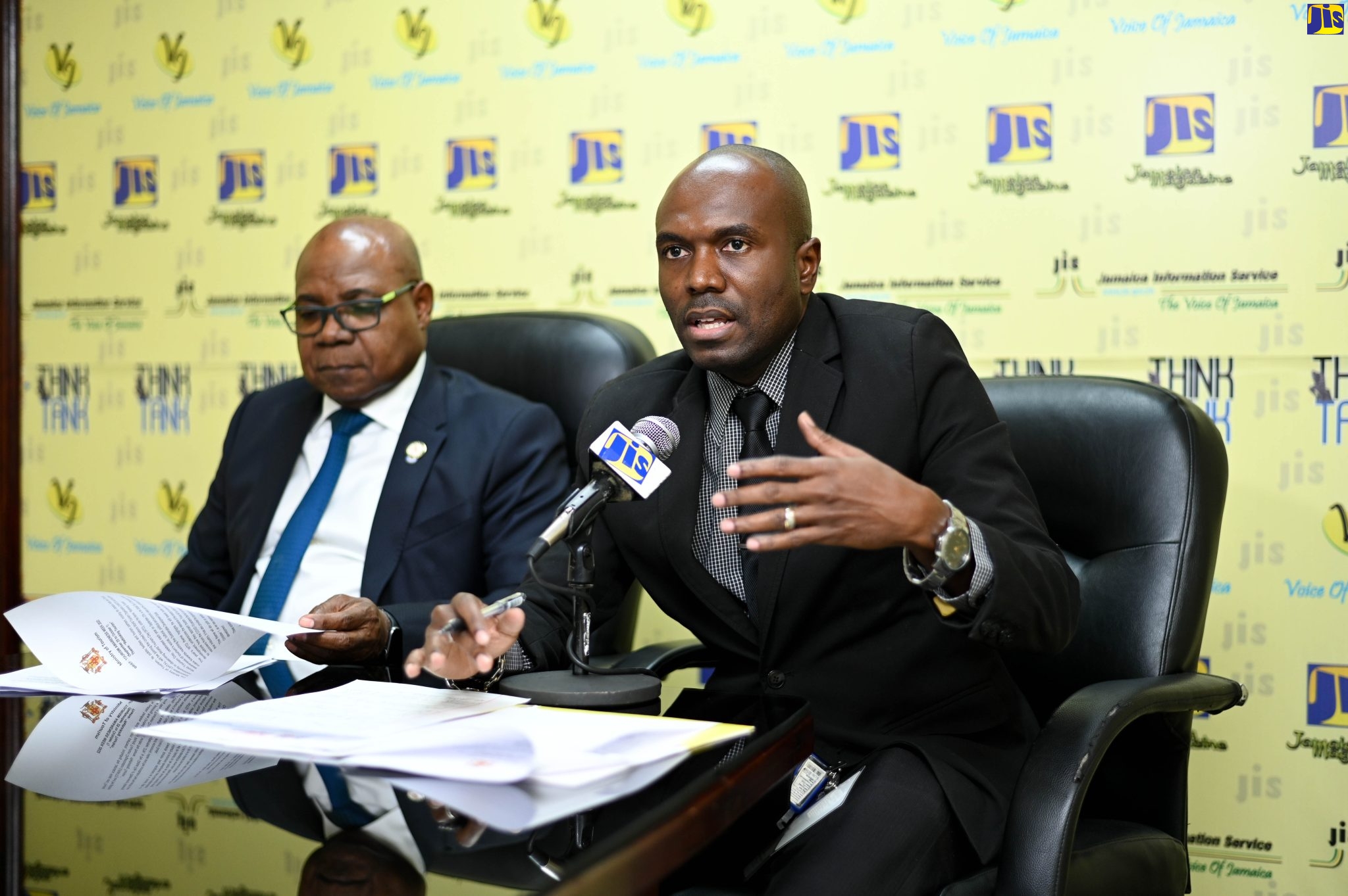 Senior Director, Corporate Communications in the Ministry of Tourism, Kingsley Roberts (right), outlines Tourism Awareness Week activities during a recent Jamaica Information Service (JIS) Think Tank.  Minister of Tourism, Hon. Edmund Bartlett also participated in session. Tourism Awareness Week is being observed from September 25 to October 1.