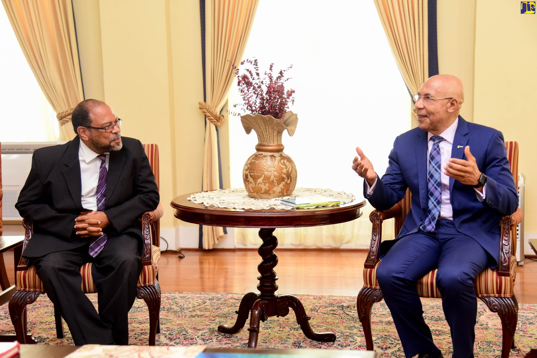 Governor-General, His Excellency the Most Hon. Sir Patrick Allen (right) speaks with the Hon. Justice David Batts, during a courtesy call at King’s House on (September 2).