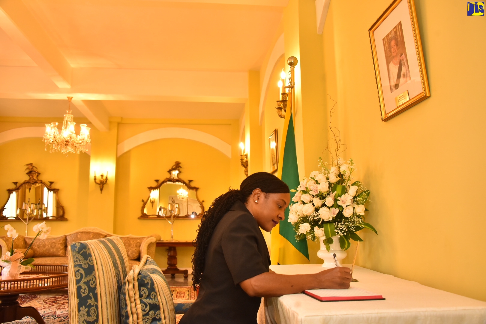 State Minister in the Ministry of Finance and the Public Service, Hon. Marsha Smith, signs the Condolence Book which was opened at King’s House for Britain’s late Monarch, Her Majesty, The Queen. Ms. Smith signed on Monday (September 12).