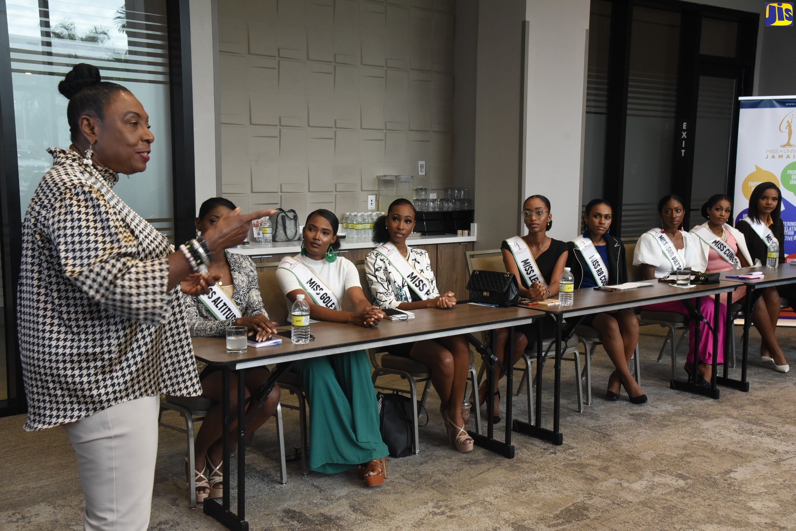 Culture, Gender, Entertainment and Sport Minister, Hon. Olivia Grange (left), addresses Miss Universe Jamaica 2022 finalists during a recent courtesy call at the Ministry’s offices on Trafalgar Road in New Kingston. 