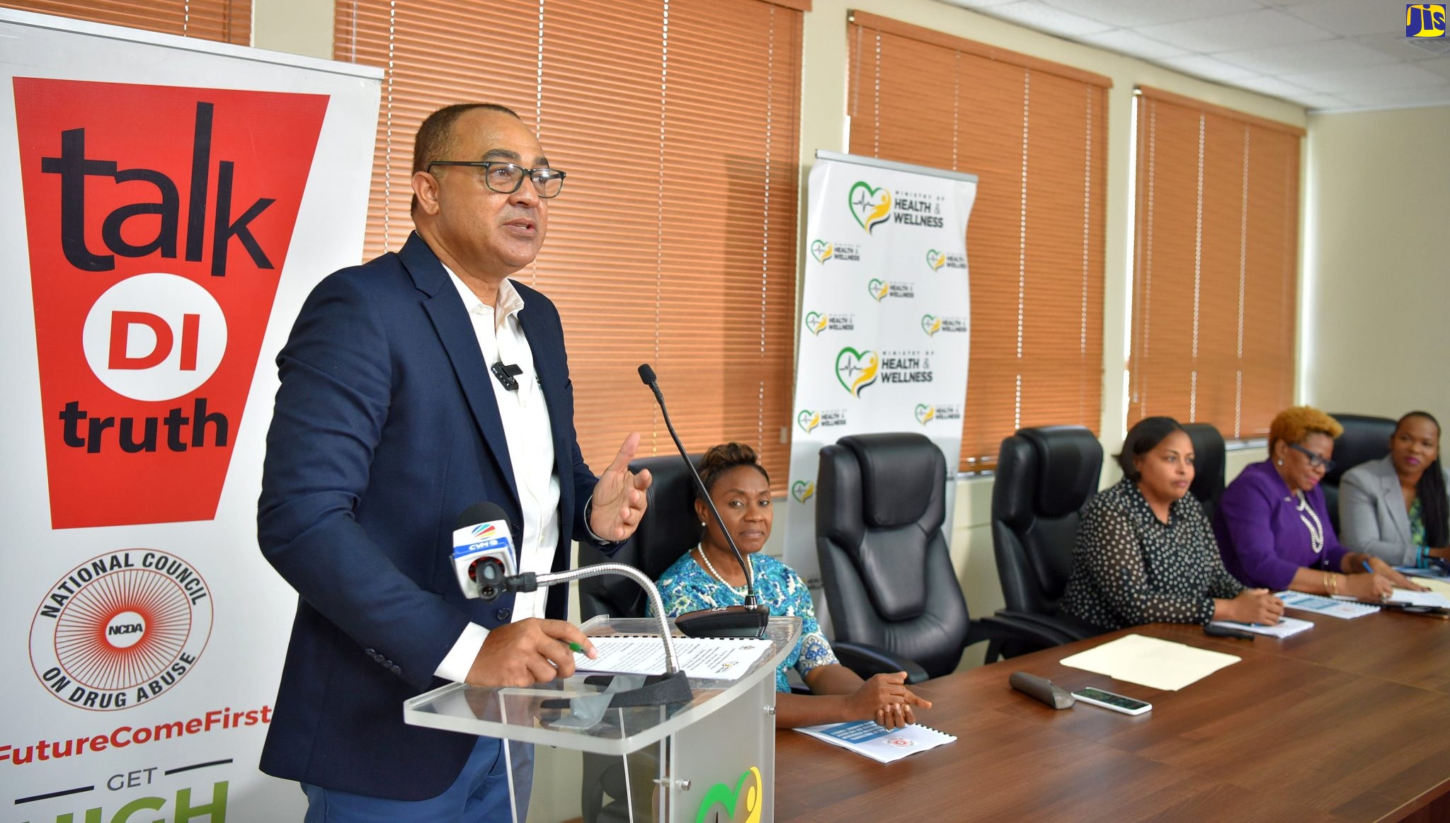 Minister of Health and Wellness, Dr. the Hon. Christopher Tufton (left), addresses a joint press conference with the Ministry of Education and Youth on the findings of a Rapid Situation Assessment on Substance Use and Urgent Issues in Secondary Schools, at the Health Ministry on Thursday (September 1). Also shown are (from left, seated) State Minister in the Ministry of Health and Wellness, Hon. Juliet Cuthbert-Flynn; Research Analyst at the National Council on Drug Abuse, Uki Atkinson; Acting Permanent Secretary in the Ministry of Education and Youth, Maureen Dwyer; and Acting Chief Education Officer in the Education Ministry, Dr. Kasan Troupe.