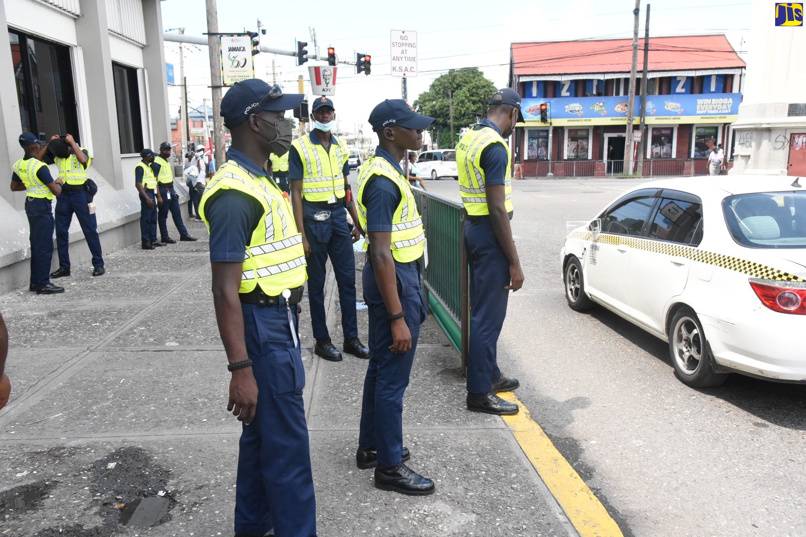 Police personnel out in their numbers along Hope Road in Half-Way-Tree, St. Andrew.