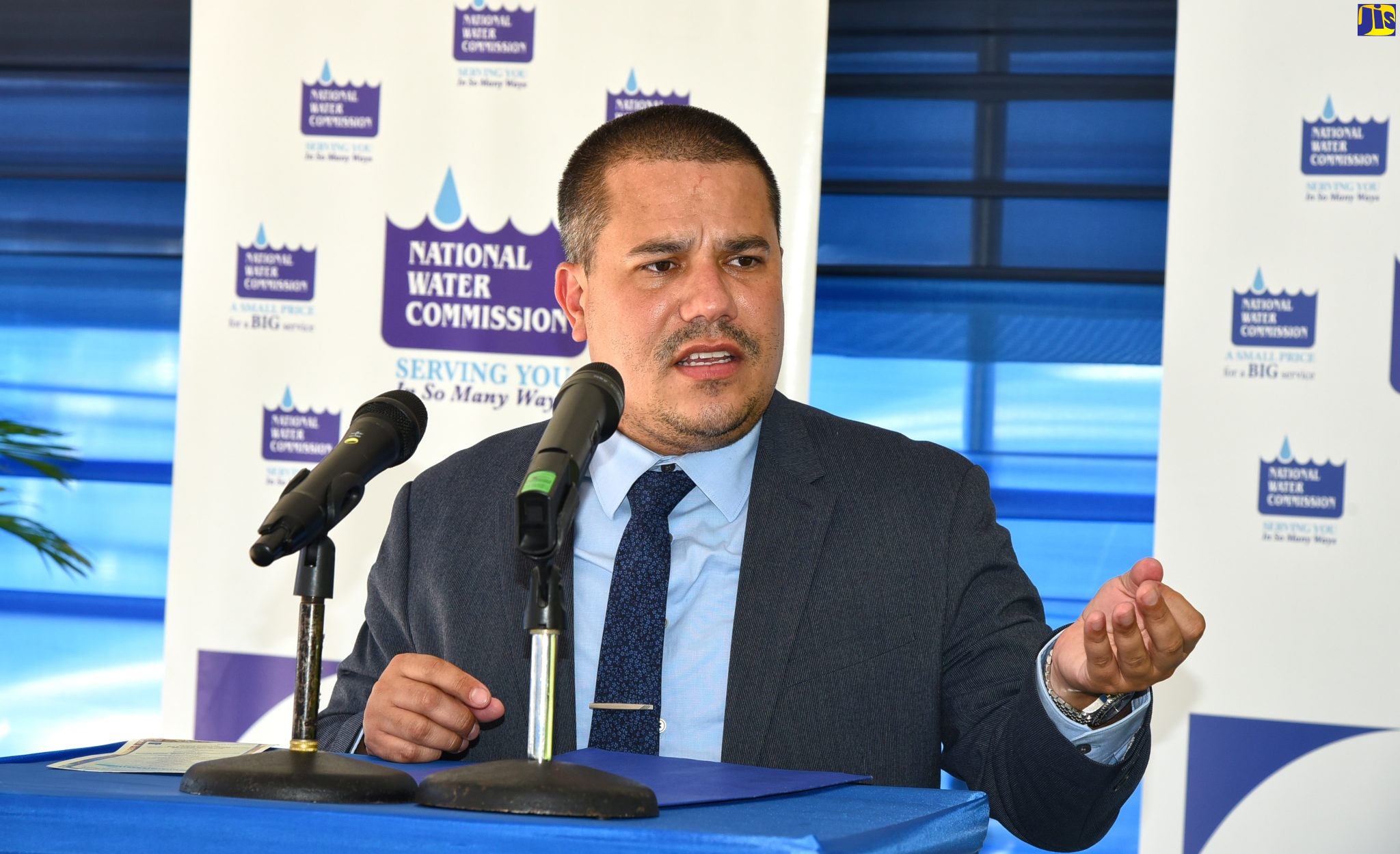 Minister without portfolio in the Ministry of Economic Growth and Job Creation, Senator the Hon. Matthew Samuda, addresses the recent commissioning of an upgraded water system in Wood Hall, Clarendon.