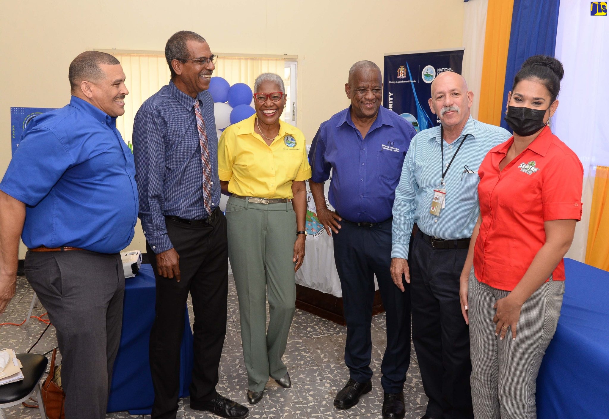 State Minister in the Ministry of Agriculture and Fisheries, Hon. Franklin Witter (third right), with  principals and sponsors of the ‘Many Moods of Tilapia’ cooking competition, which was launched today (September 19),  at the Farmers’ Training Centre in St. Catherine. From left are: Marketing and Corporate Affairs Manager, Rainforest Caribbean, Andrew Lewis; Chief Executive Officer, National Fisheries Authority (NFA), Gavin Bellamy; Senior Director of Corporate Services, NFA, Angela Patterson; Chairman of the NFA Board, Lieutenant Commander George Overton and Marketing Manager, Spur Tree Spices, Rani Badaloo.