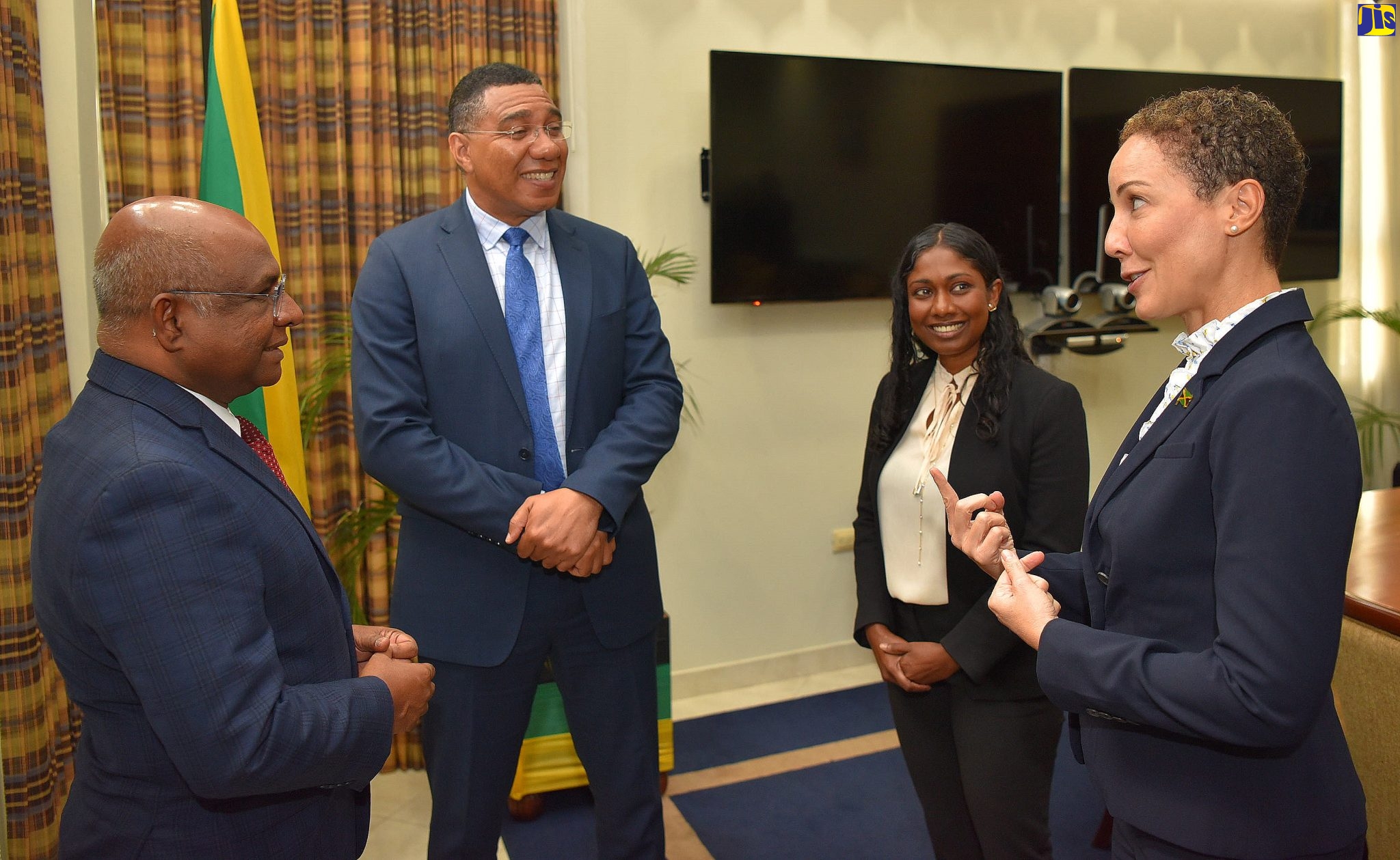 Prime Minister the Most Hon. Andrew Holness (second left); President of the 76th Session of the United Nations General Assembly (UNGA), His Excellency Abdulla Shahid (left); and Special Envoy to Mr. Shahid, Her Excellency Thilmeeza Hussain (second right), are engaged in discussion with Minister of Foreign Affairs and Foreign Trade, Senator the Hon. Kamina Johnson Smith, during a meeting on Monday (September 5). The meeting was held at the Office of the Prime Minister. 