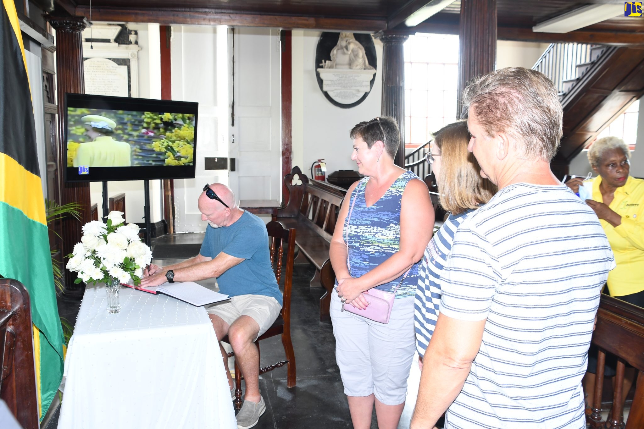 St. James Residents, Visitors Sign Condolence Book for the Queen