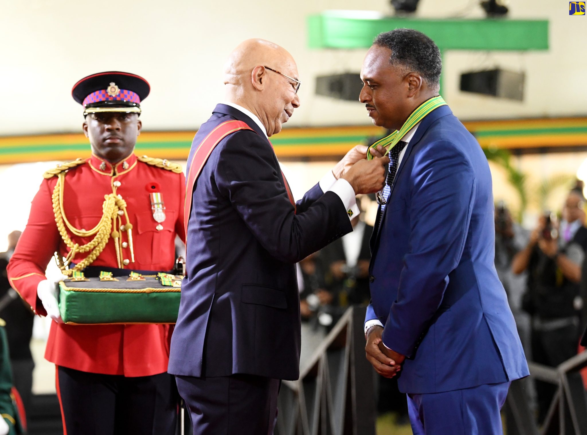 Governor-General, His Excellency the Most Hon. Patrick Allen, presents the Order of Distinction in the Rank of Commander (CD), to Managing Director of the Jamaica Social Investment Fund (JSIF), Omar Sweeney, for contribution to Public Service, during the National Honours and Awards Ceremony held at King’s House recently.