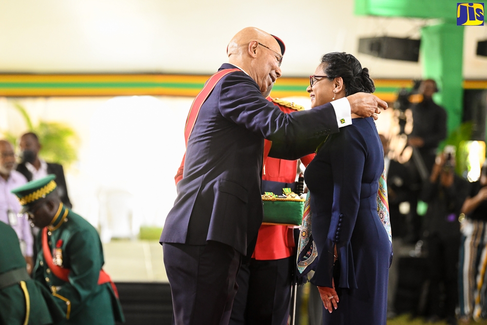 Governor-General, His Excellency, the Most Hon. Sir Patrick Allen, presents Chief Medical Officer (CMO), Dr. Jacquiline Bisasor-McKenzie with the Order of Distinction in the rank of Commander (CD) for outstanding public service in the field of health, during the National Honours and Awards presentation ceremony held at King’s House on Monday (October 17).