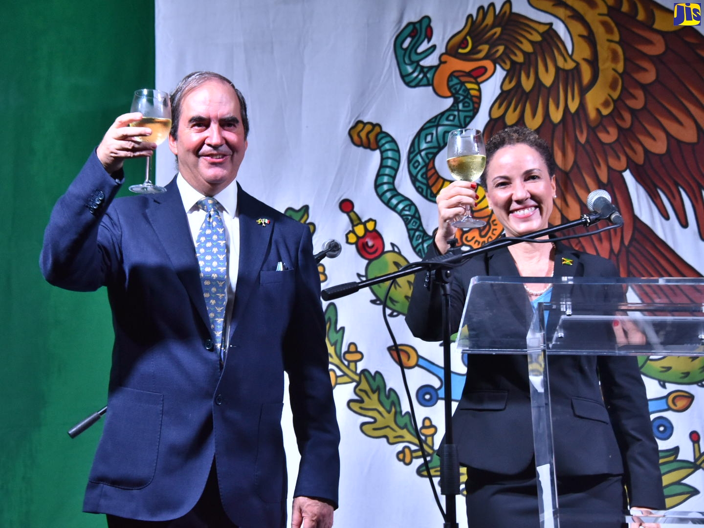 Minister of Foreign Affairs and Foreign Trade, Senator the Hon. Kamina Johnson Smith (right), and Mexico’s Ambassador to Jamaica, His Excellency Juan José Gonzales Mijares, raise a toast during a reception to commemorate the country’s 212th Independence Anniversary. The function was hosted at the Ambassador’s Cherry Gardens residence in St. Andrew, on Friday (September 30).