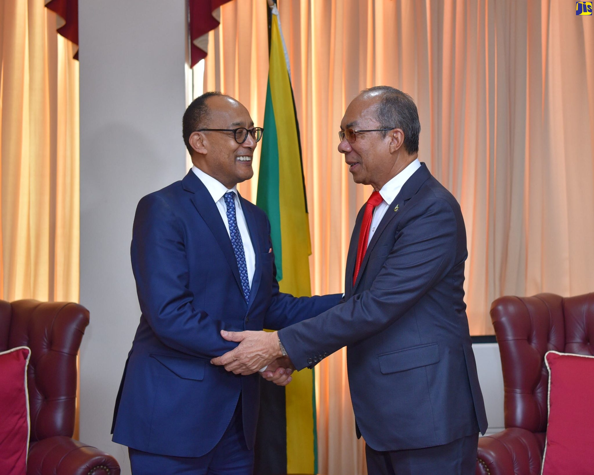 Deputy Prime Minister and Minister of National Security, Hon. Dr. Horace Chang (right), greets President of the Crown Council of the Federal Democratic Republic of Ethiopia, His Imperial Highness, Prince Ermias Sahle Selassie, during his courtesy call at the Office of the Prime Minister (OPM) on Friday (October 14). Prince Ermias, who is the grandson of late Ethiopian Emperor, His Imperial Majesty, Haile Selassie I; his wife, Princess Saba Kebede, and members and advisors of the Crown Council, who arrived in Jamaica on October 13, are visiting as guests of the Government. Among the other engagements they are slated to participate in are activities marking Heritage Week, and in observance of National Heroes Day, on Monday, October 17.