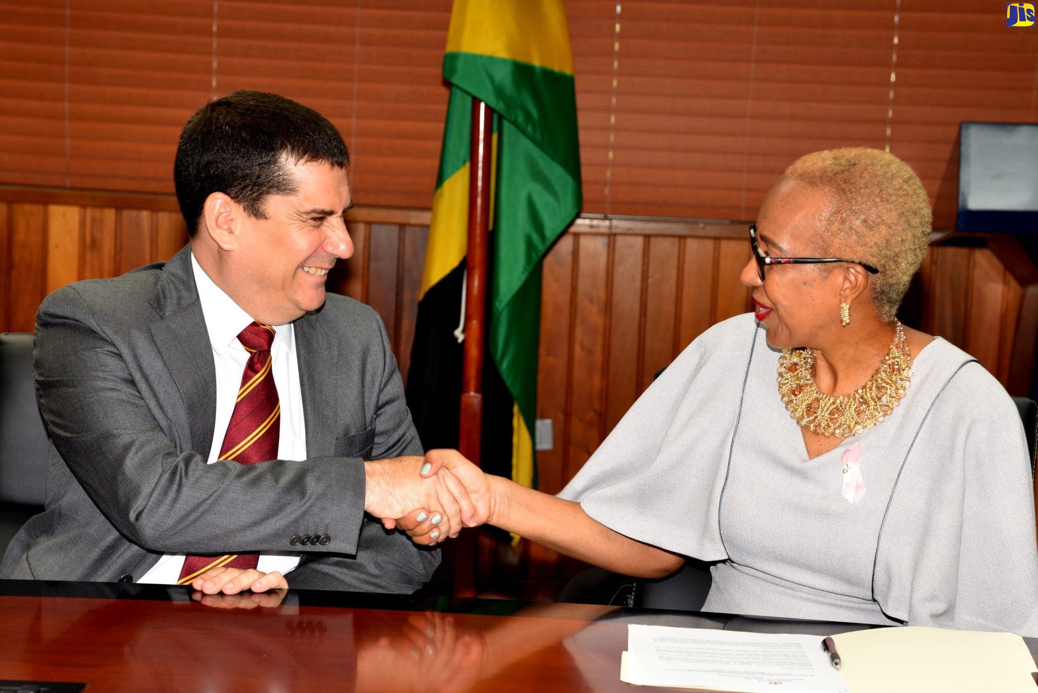 Minister of Education and Youth, Hon. Fayval Williams (right), welcomes  Ambassador of the Republic of Cuba to Jamaica, 
His Excellency Fermin Quiñones Sánchez, during a courtesy call at the Ministry’s office in Kingston, on Wednesday (October 5). 
