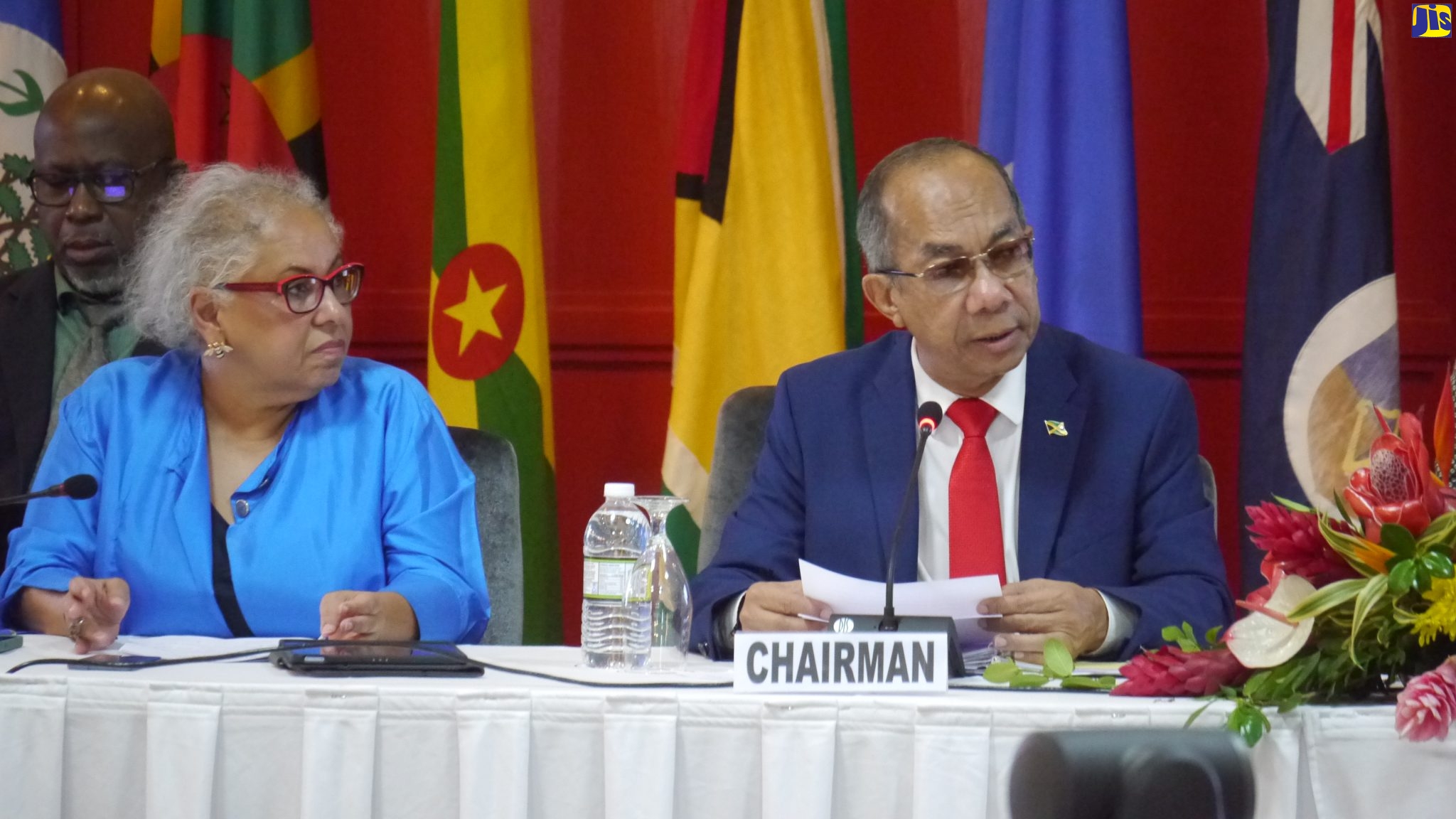 Deputy Prime Minister and Minister of National Security, Hon. Dr. Horace Chang (right), addresses the 24th meeting of the Council for National Security and Law Enforcement (CONSLE) at Ocean Coral Spring in Trelawny on Thursday (October 6). Looking on is Assistant Secretary-General of CARICOM, Alison Drayton.