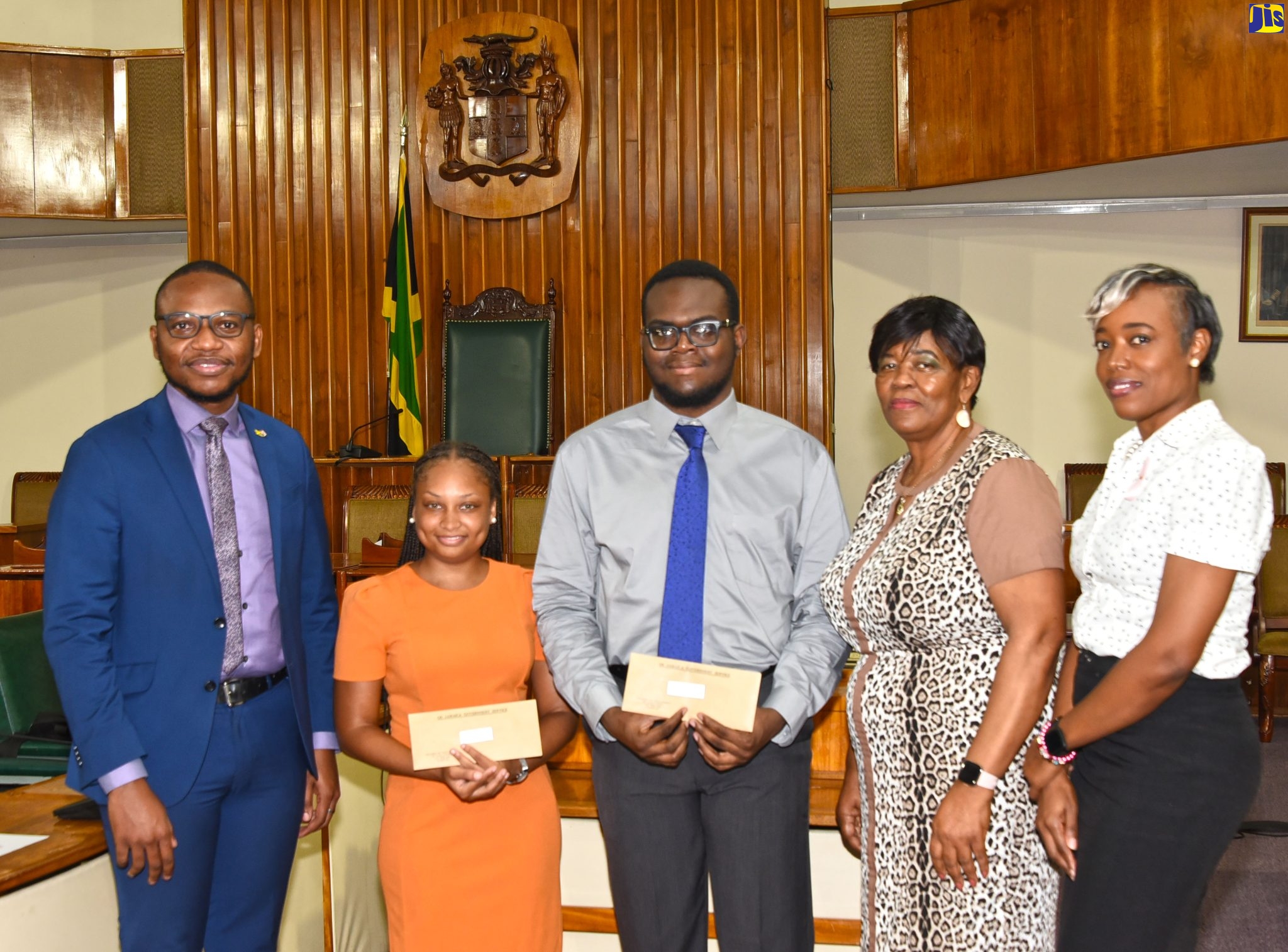 Clerk to the Houses of Parliament, Valrie Curtis (second right); Deputy Clerk, Houses of Parliament, Colleen Lowe (right); and Coordinator, Parliamentary Internship Programme, Dr. Donovan Johnson (left), share a photo opportunity with new parliamentary interns Anatassia Balfour (second left) and Aaron Hoilett during the induction ceremony at Gordon House, 81 Duke Street, downtown Kingston, on October 6.