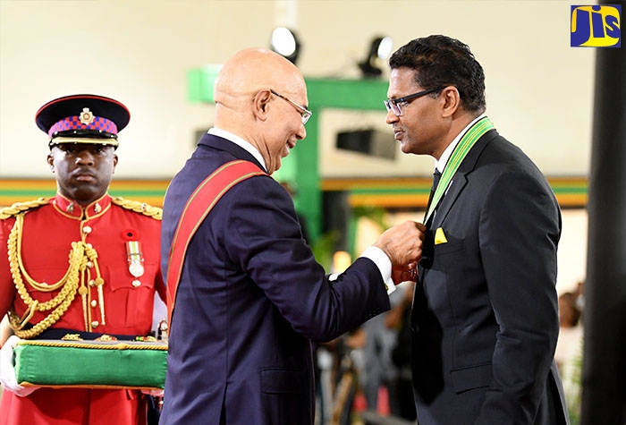 Governor-General, His Excellency the Most Hon. Sir Patrick Allen, presents Seprod Group Chief Executive Officer, Richard Pandohie, with the Order of Distinction in the rank of Commander (CD) for contribution to the Manufacturing Sector. The presentation was made during the National Honours and Awards Ceremony at King’s House, on October 17. The ceremony was the main event commemorating National Heroes’ Day.