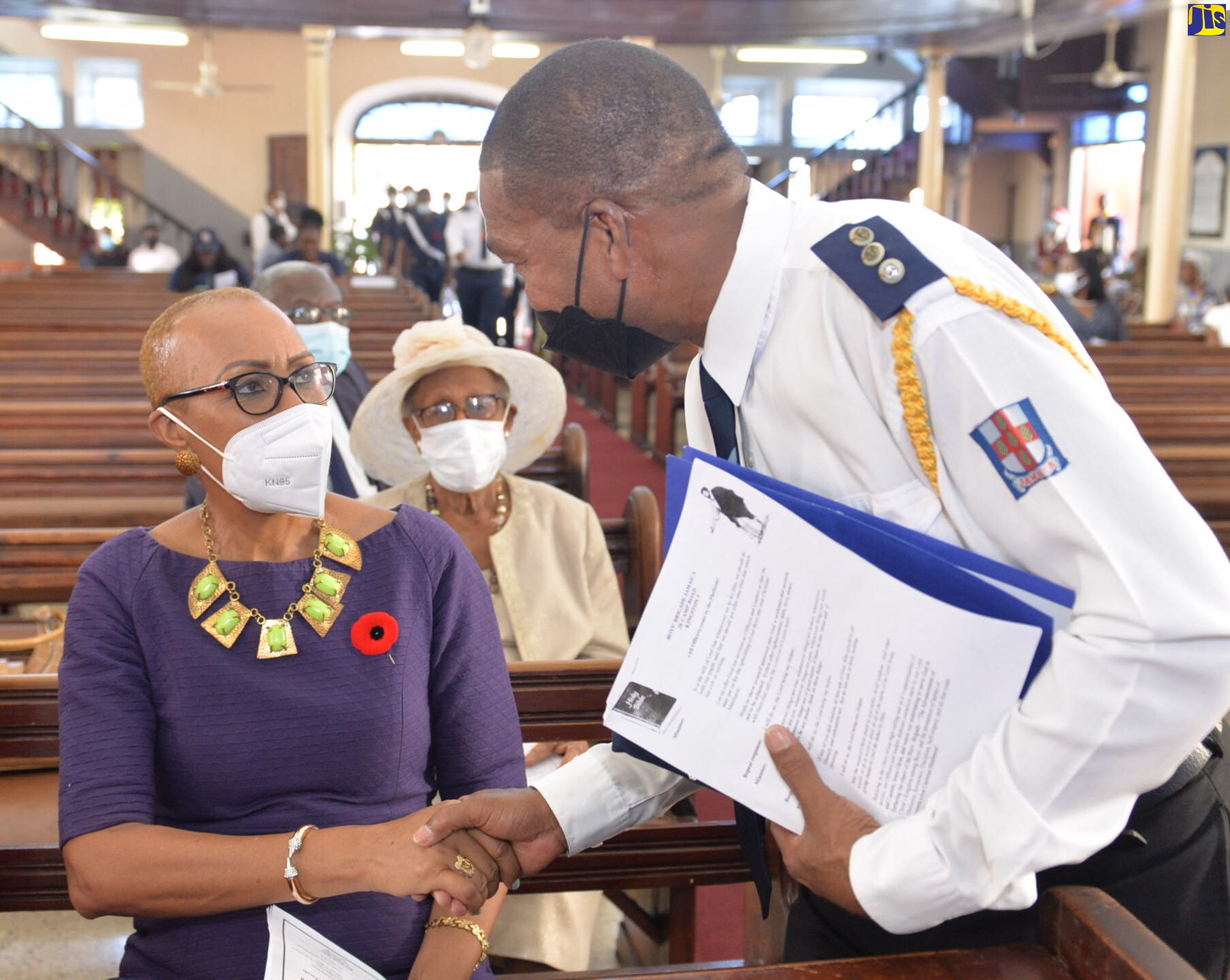 Minister of Education and Youth, Hon. Fayval Williams (left), greets National President, Boys’ Brigade, Captain Sydney England, during the organisation’s Annual Founder’s Day Service at East Queen Street Baptist Church in Kingston on Sunday (October 23).