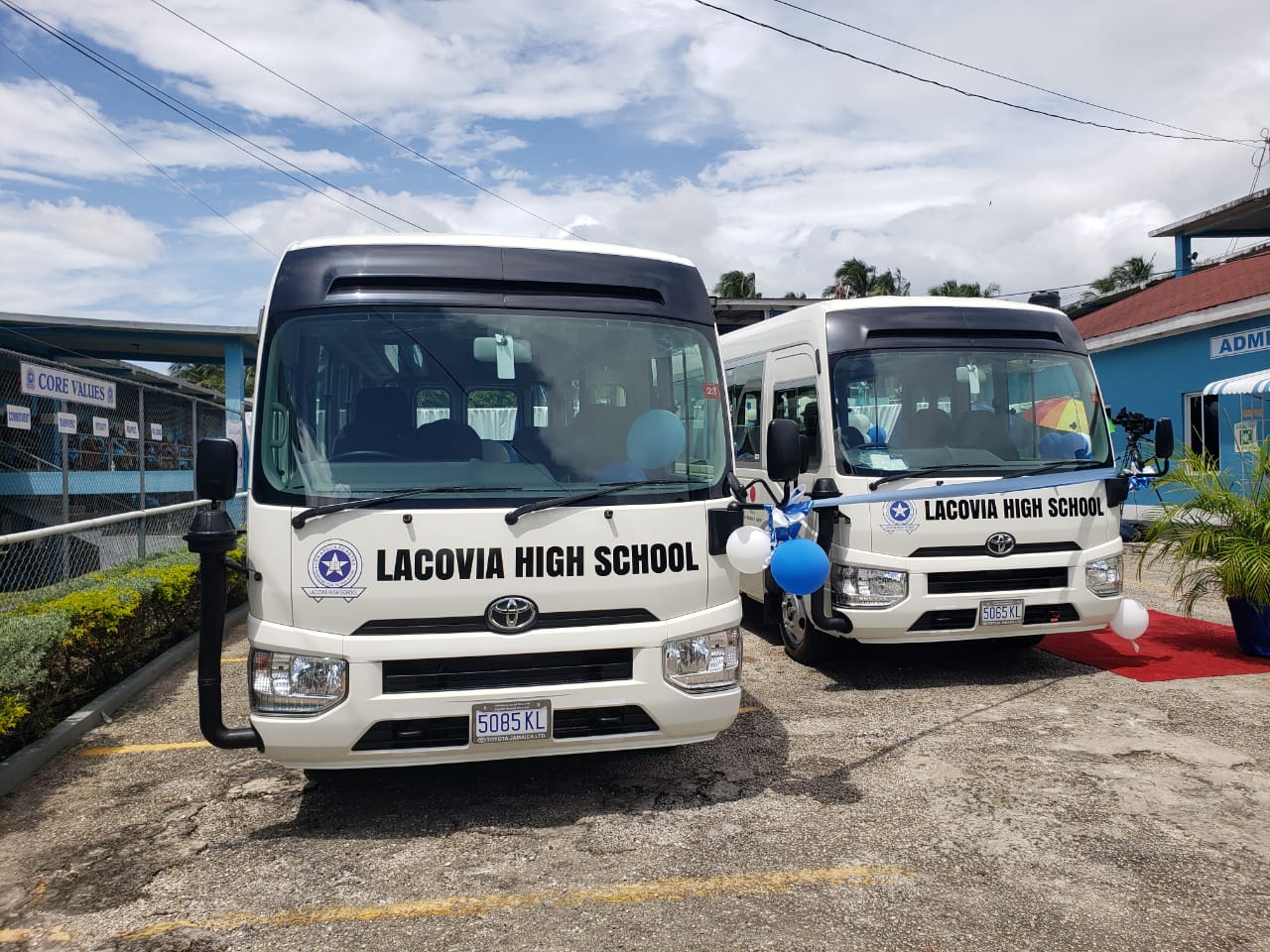 The two coaster buses that were handed over to the Lacovia High Schoo, in St. Elizabeth, on October 7, by the Grant Assistance for Grassroots Human Security Project of the  Government of Japan .  