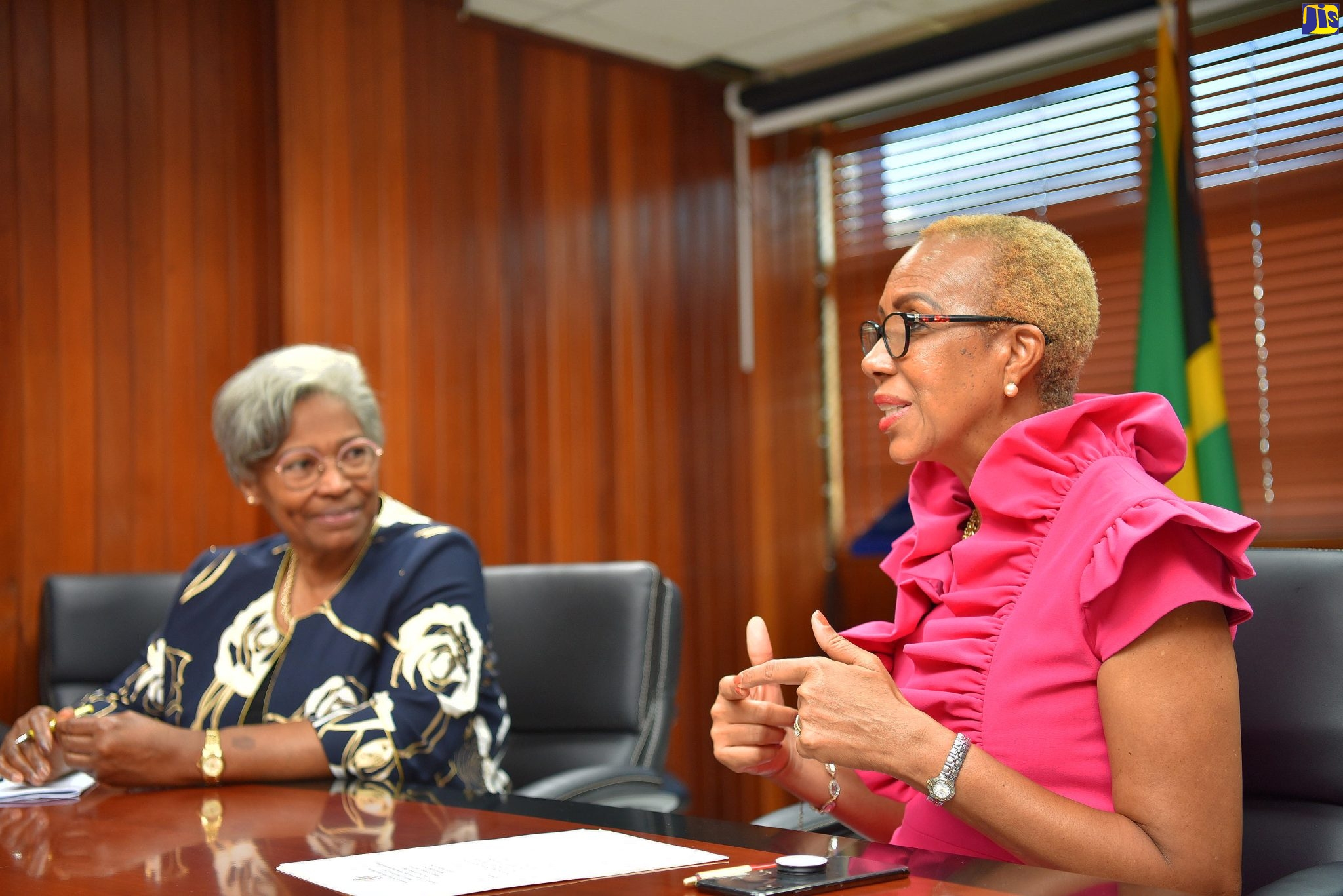 Minister of Education and Youth, Hon. Fayval Williams (right), emphasises a point in discussion with Founding Chief Executive Officer for the Ontario Literacy and Numeracy Secretariat and former Ontario Education Commissioner in Canada, Dr. Avis Glaze, during a courtesy call at the Ministry