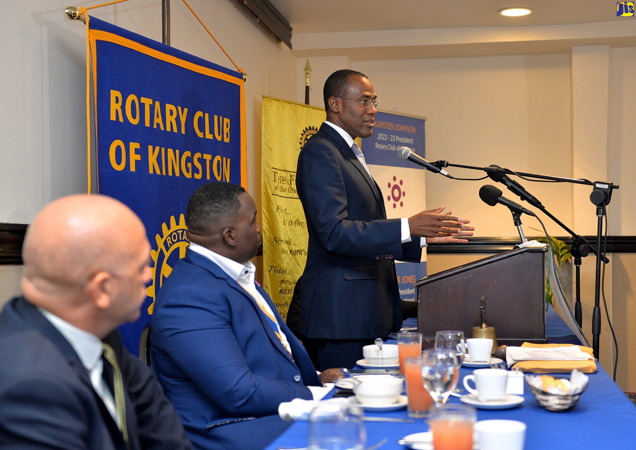 Minister of Finance and the Public Service, Dr. the Hon. Nigel Clarke (at podium), addresses the Rotary Club of Kingston