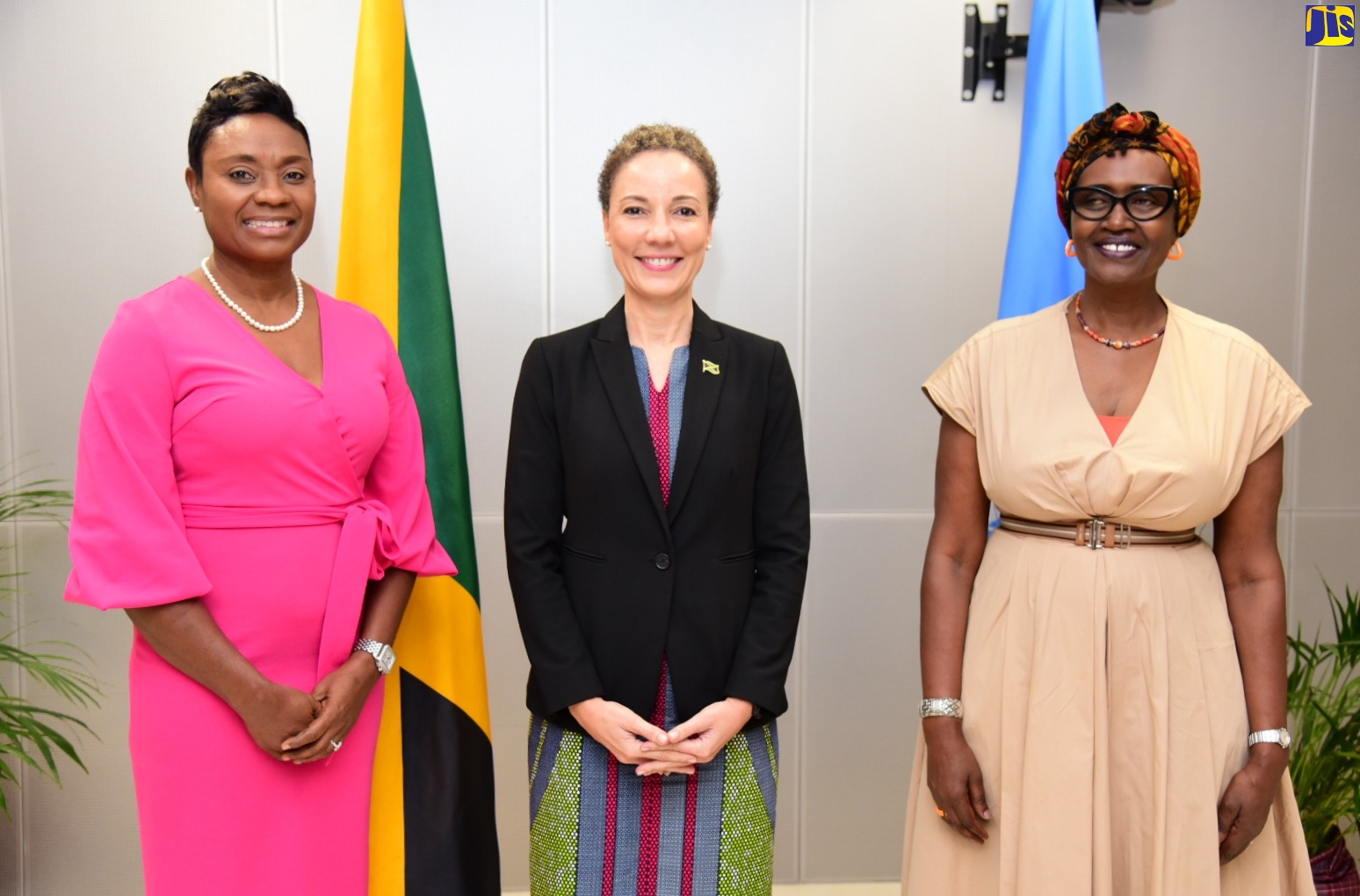 PHOTOS: Minister Johnson Smith Greets UNAIDS Official